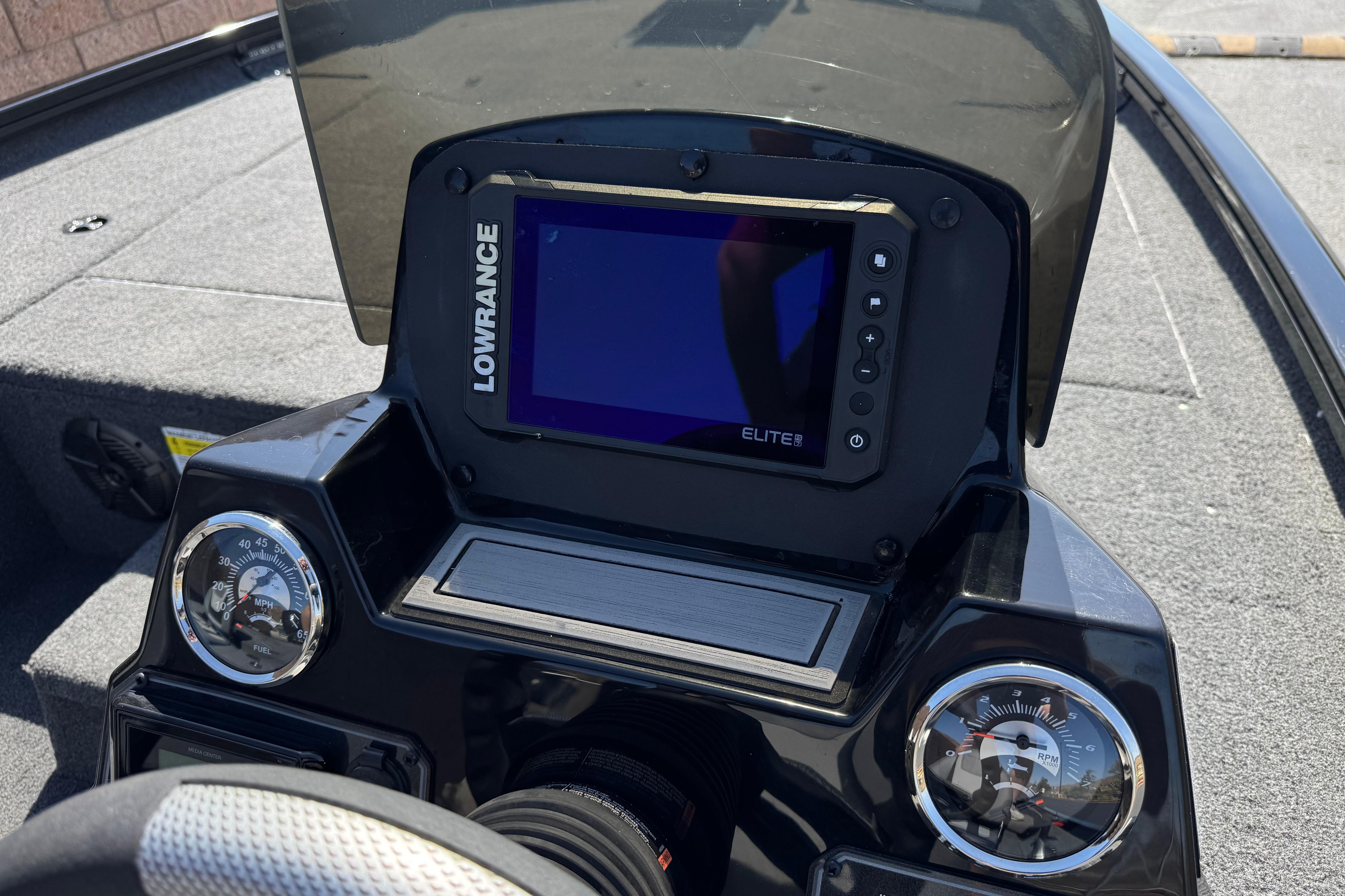 2024 Lowe Stinger 175 dashboard featuring Lowrance Elite fishfinder and gauges.