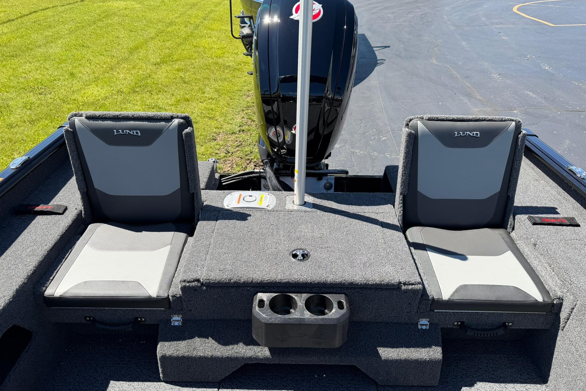 2027 Lund 1775 Impact XS Sport boat interior with dual seats and motor view.