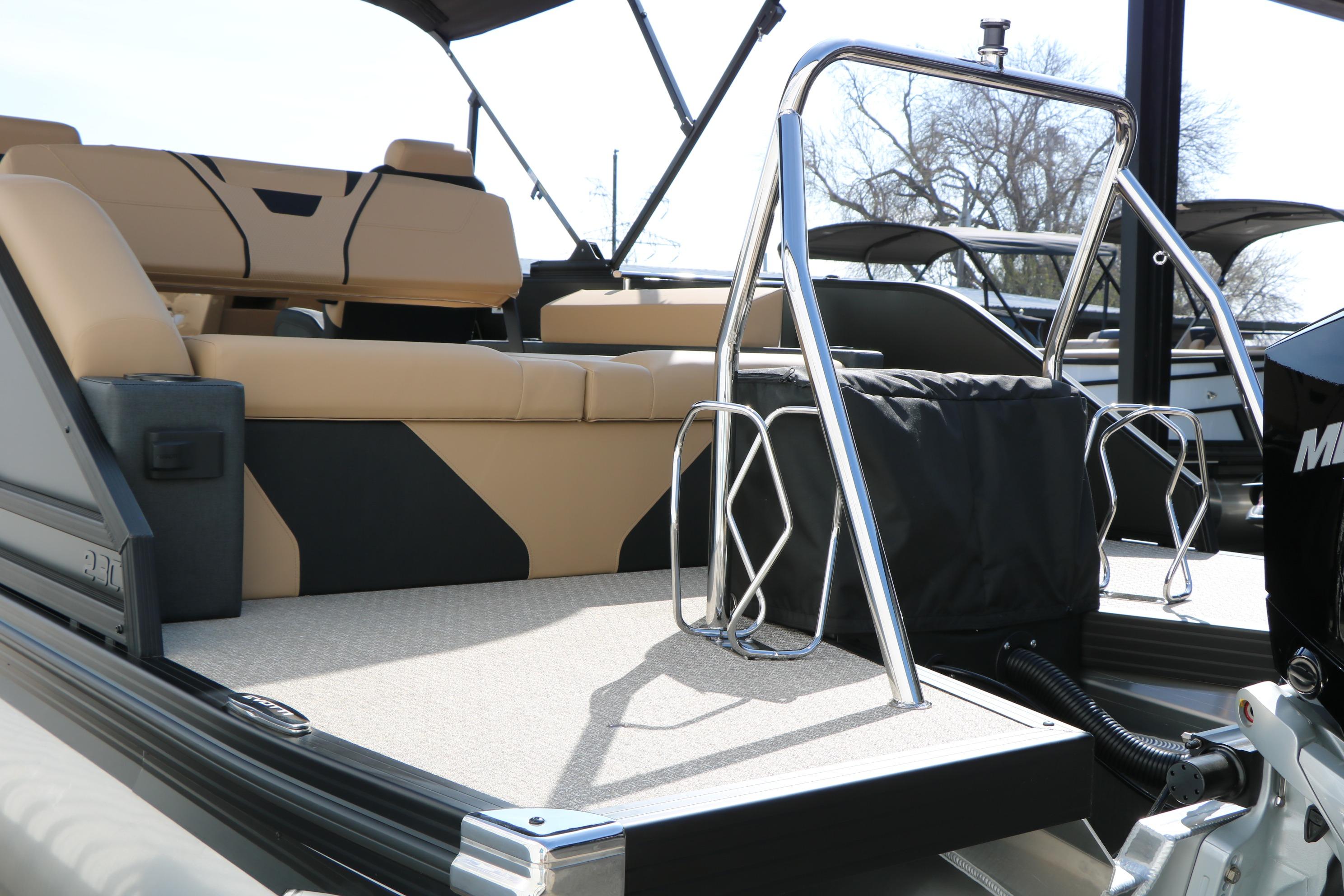 Luxury interior of 2026 Evotti 723CS boat with beige seating and sleek design elements.