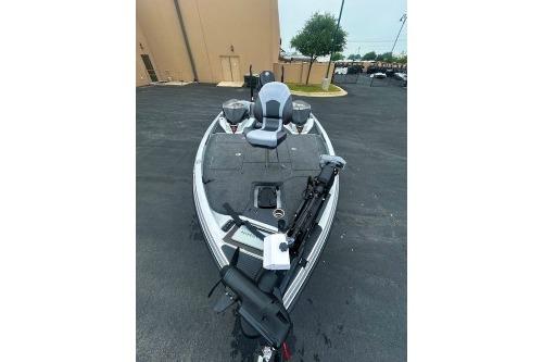 2026 Ranger Z518 Cup-Equipped boat with fishing gear on a paved surface.