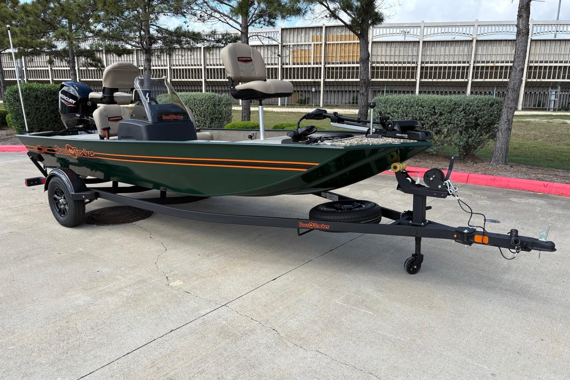 2026 Tracker Bass Tracker Classic Limited boat on trailer, parked outdoors.