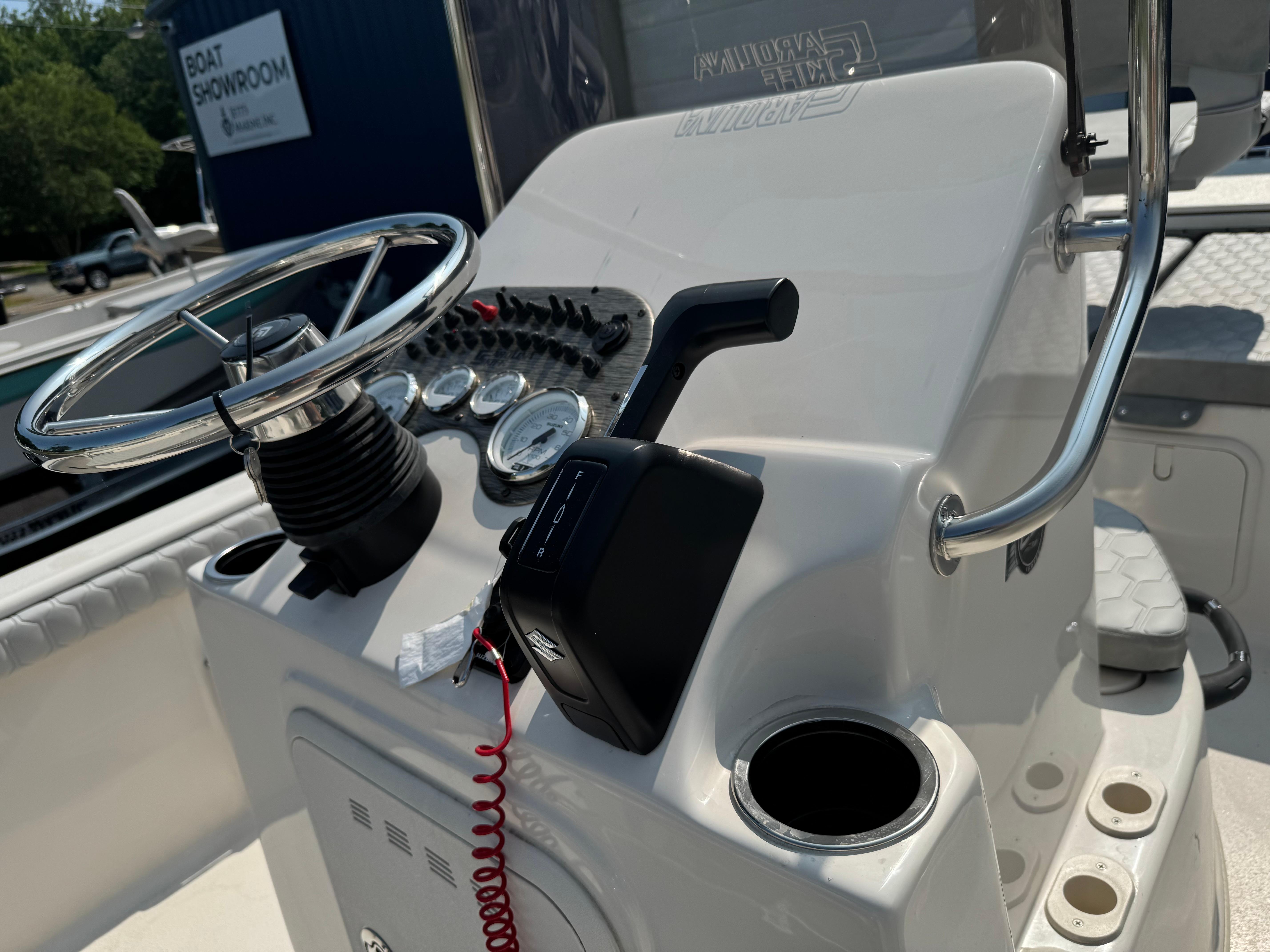 2025 Carolina Skiff 19 LS boat console with steering wheel and controls.