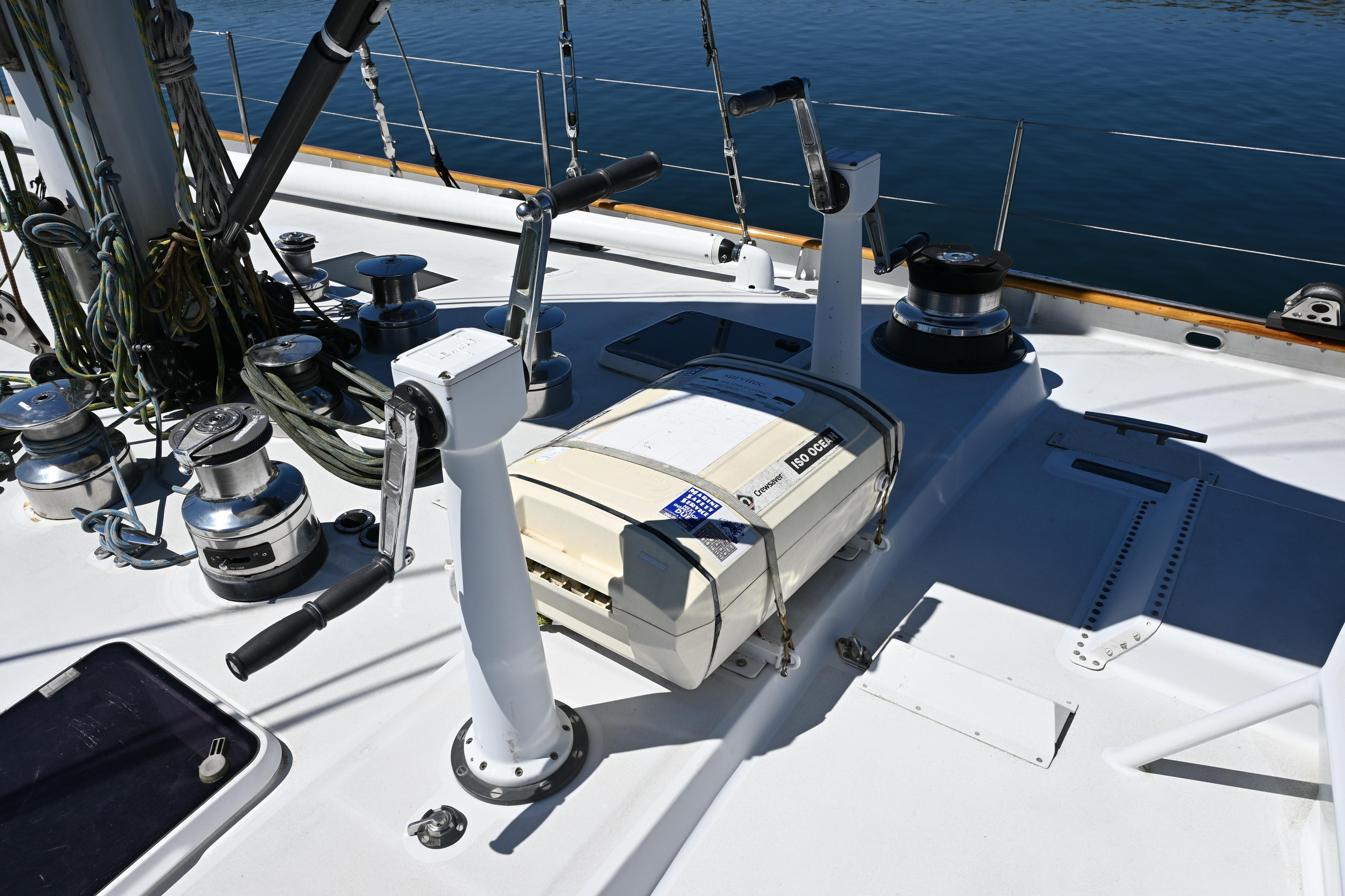 Deck of 1968 Abeking & Rasmussen Tripp 74 yacht with winches and rigging.
