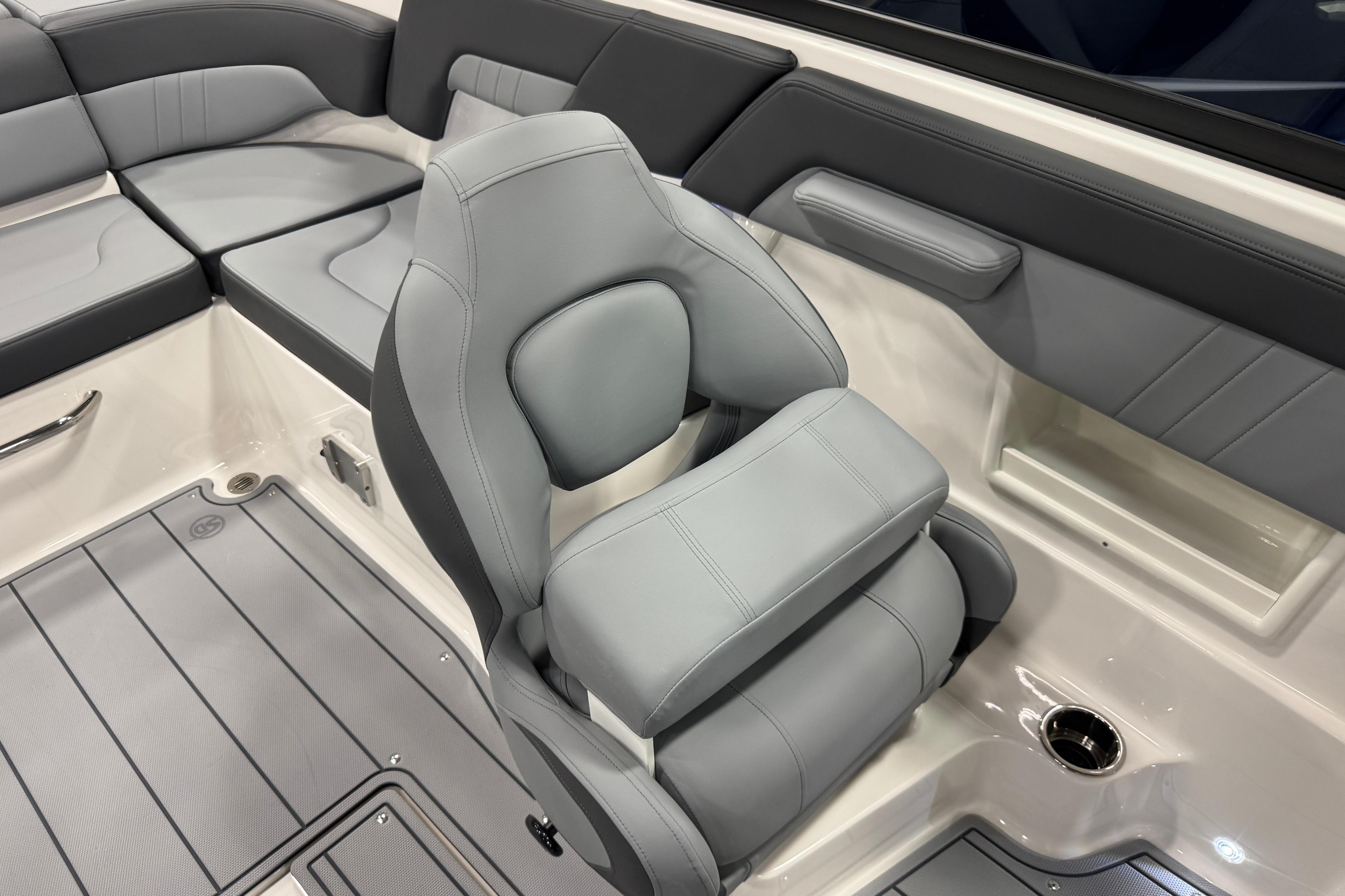 2026 Chaparral 23 SSi boat interior with gray seating and modern design.