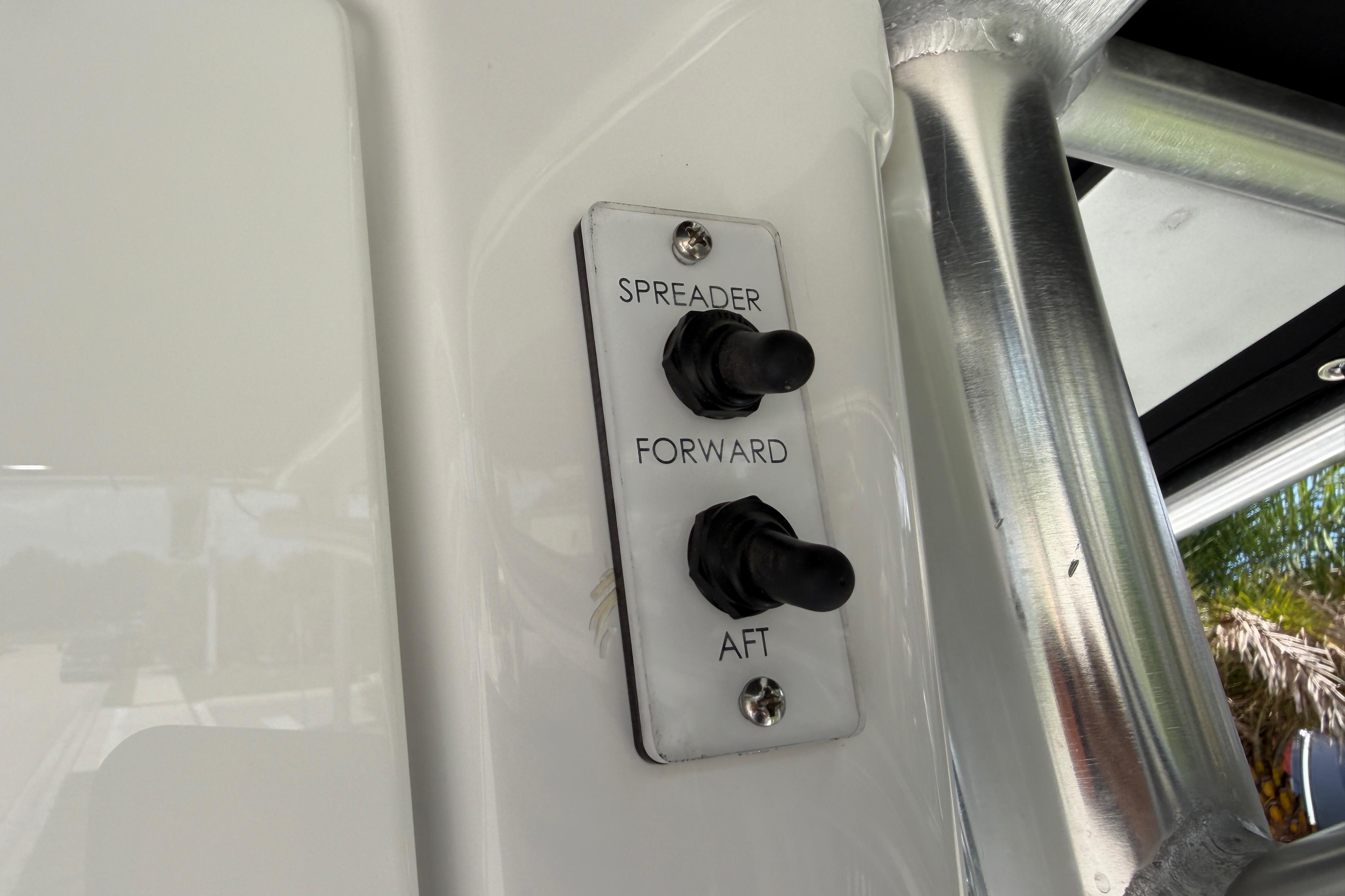 Control panel on 2023 Tidewater 198 CC Adventure boat with spreader, forward, aft switches.