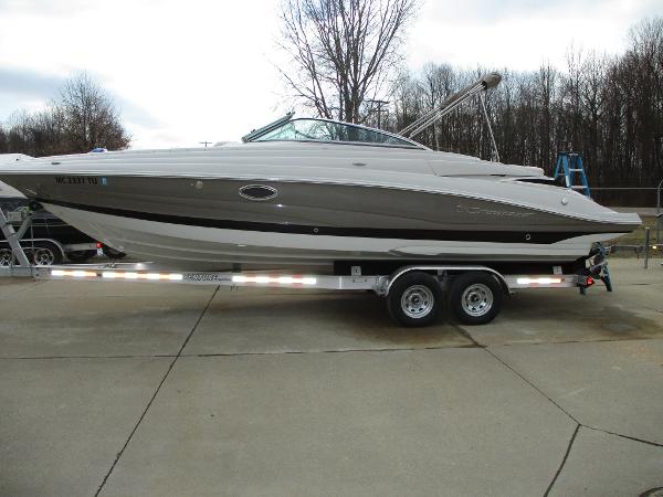 2015 Crownline 285 SS boat on trailer, side view.