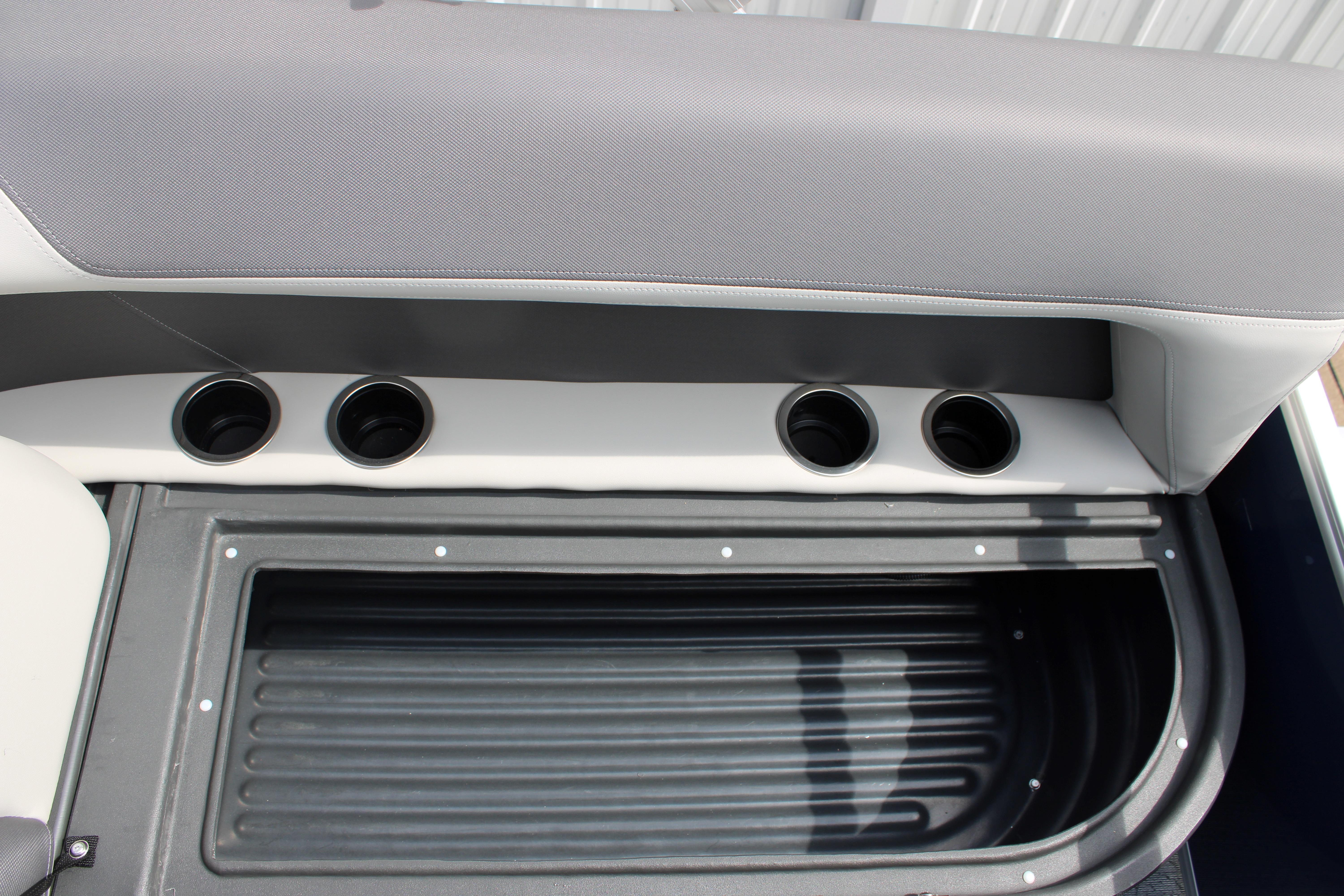 Interior of 2026 Sun Tracker Bass Buggy 16 XL Select with cup holders and storage.