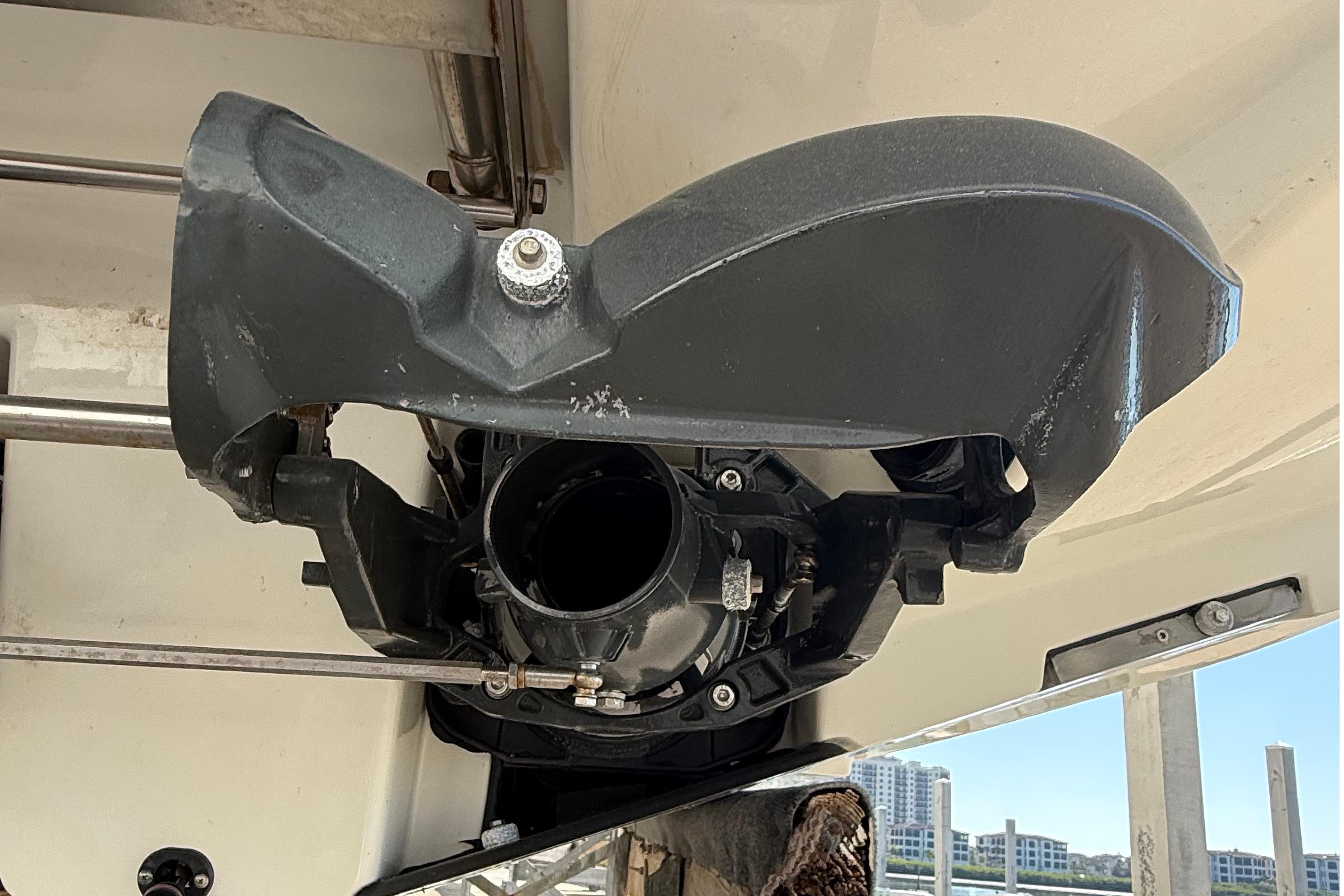 2021 Scarab 255 ID boat engine component, close-up view, showcasing mechanical details.