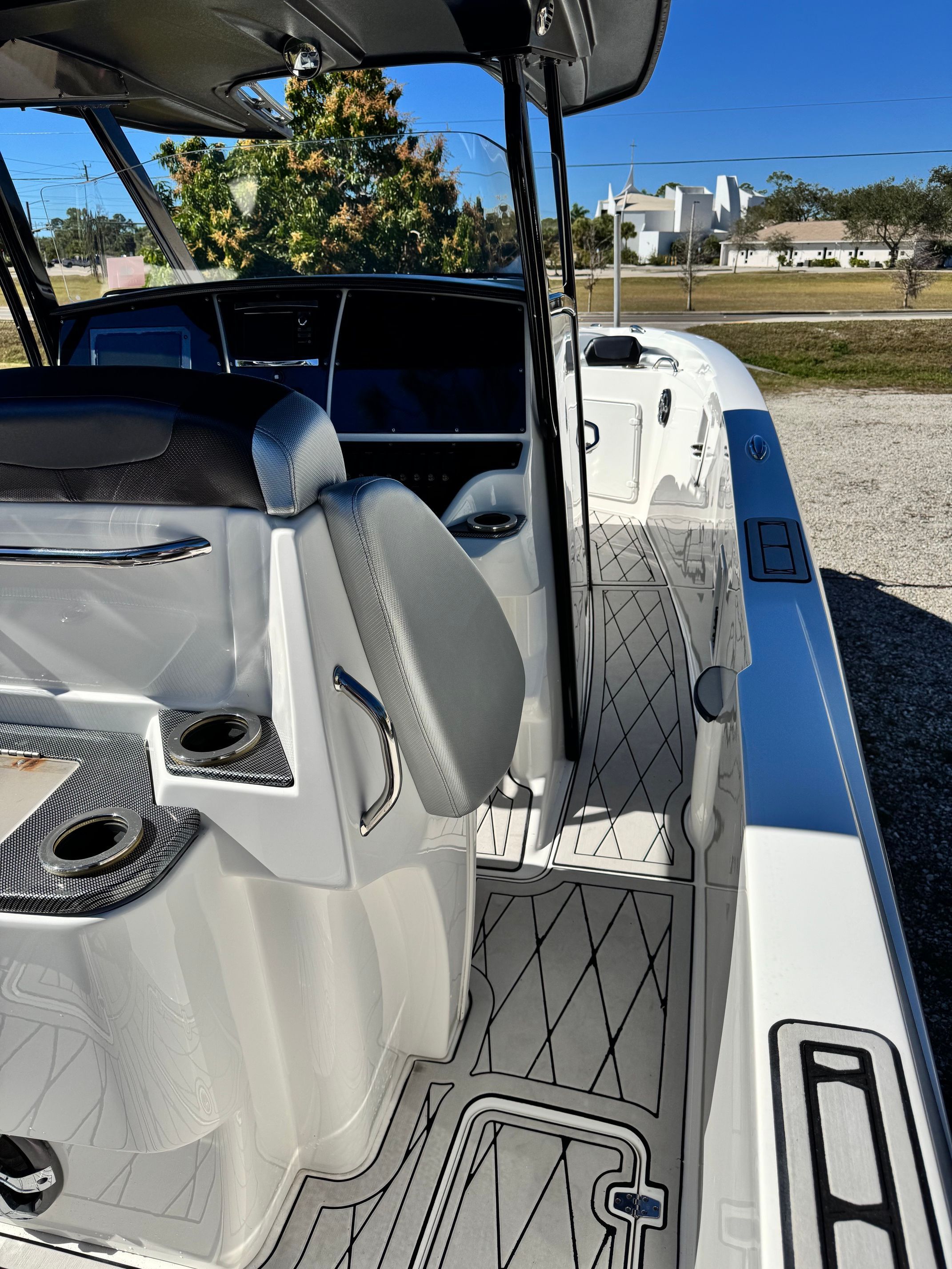 Interior view of a 2017 Sunsation 32 CCX boat with modern seating.