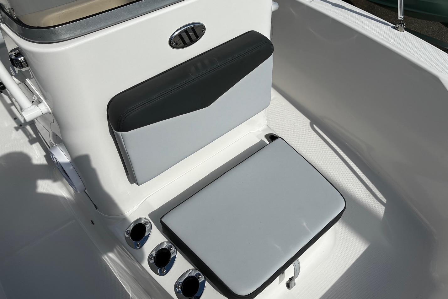 2026 Robalo R160 Center Console boat seating and rod holders.