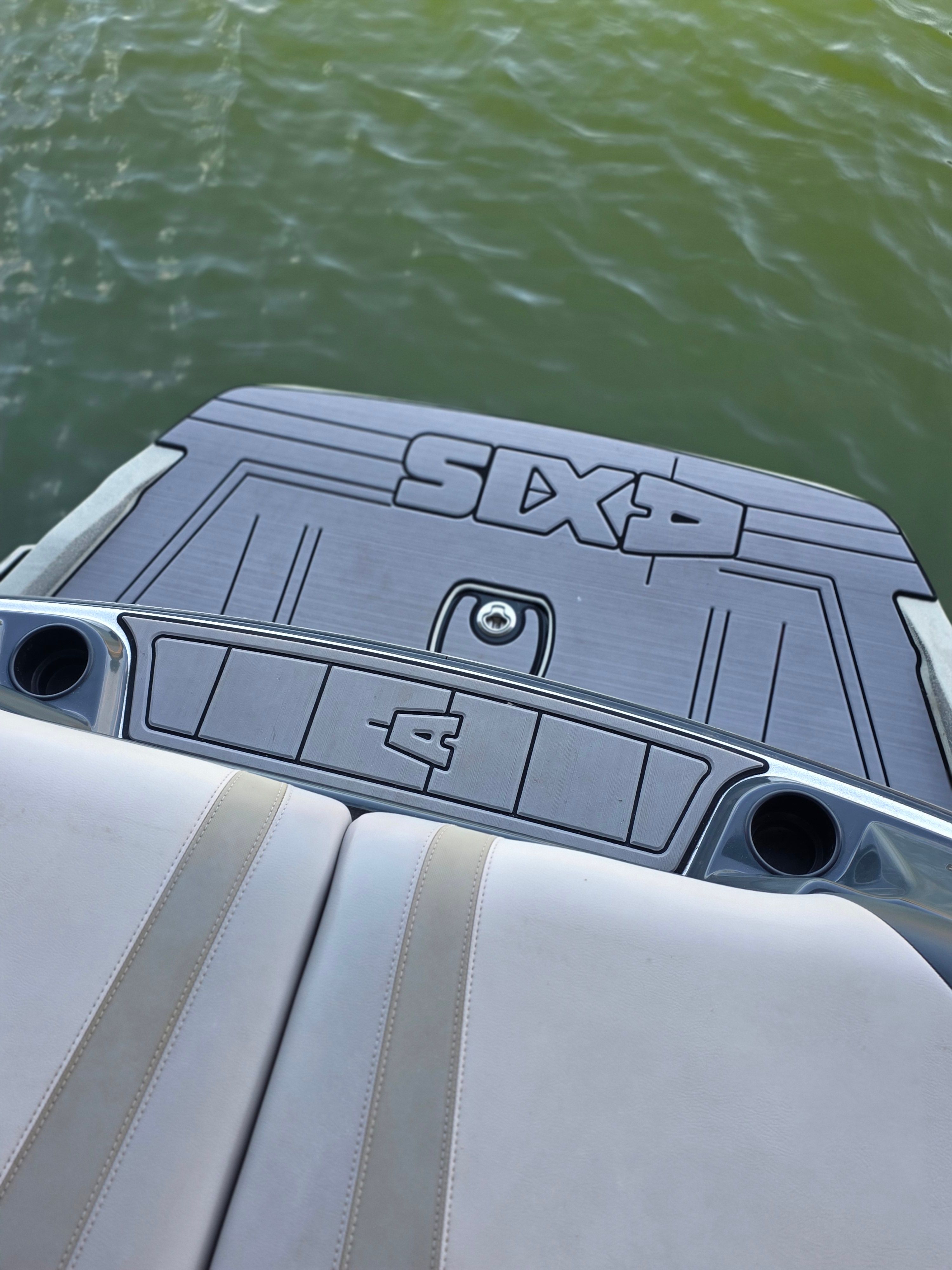 The image shows the stern of a 2017 Axis T23 boat with a gray deck.