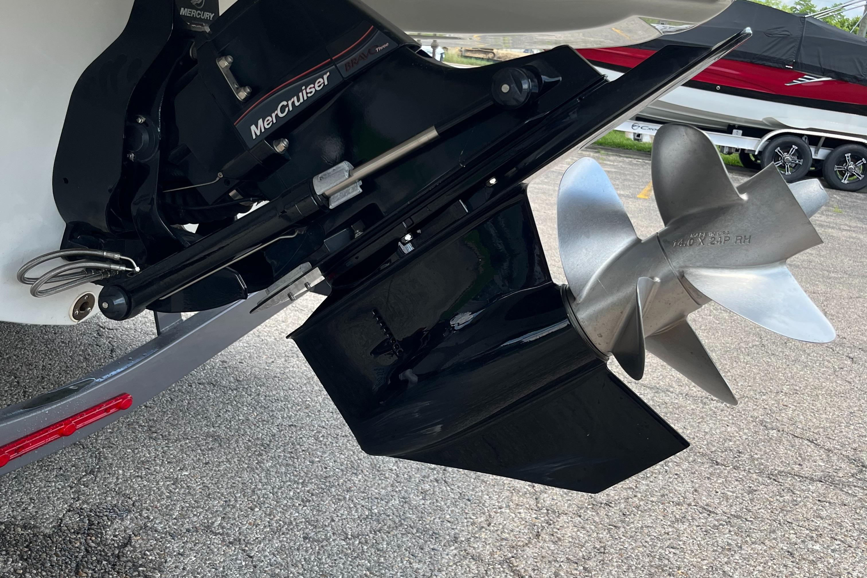 2022 Crownline 280 SS boat with MerCruiser propeller and outdrive detail.