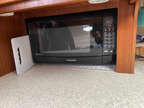 Panasonic microwave in a 2003 Tiara Yachts 3500 Open kitchen area.