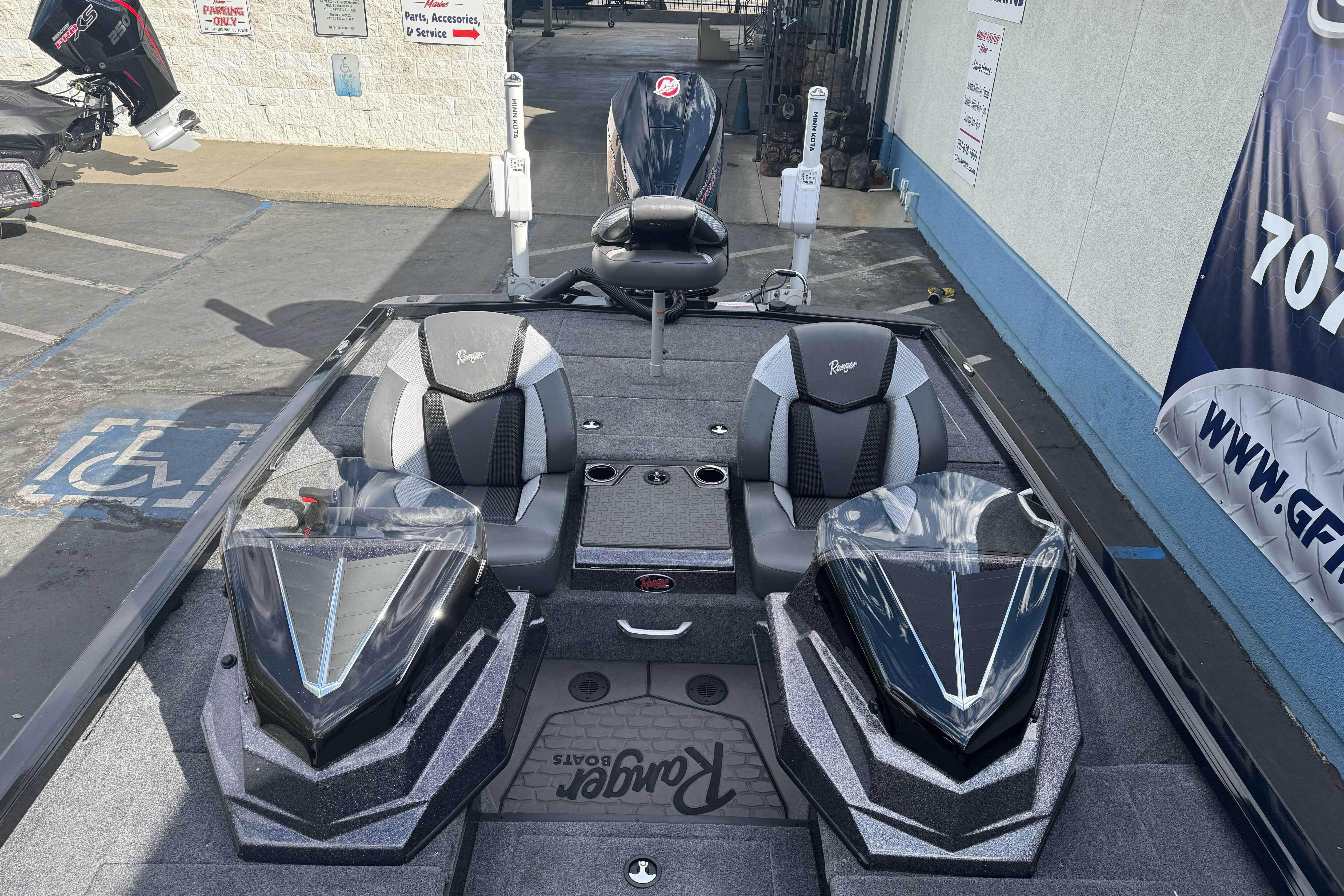 2026 Ranger ALPHA 208 boat interior with dual seats and sleek design.