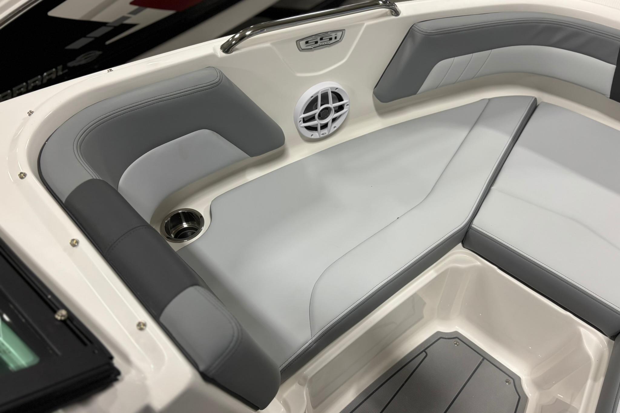2026 Chaparral 21 SSi OB boat interior with gray seating and speaker.