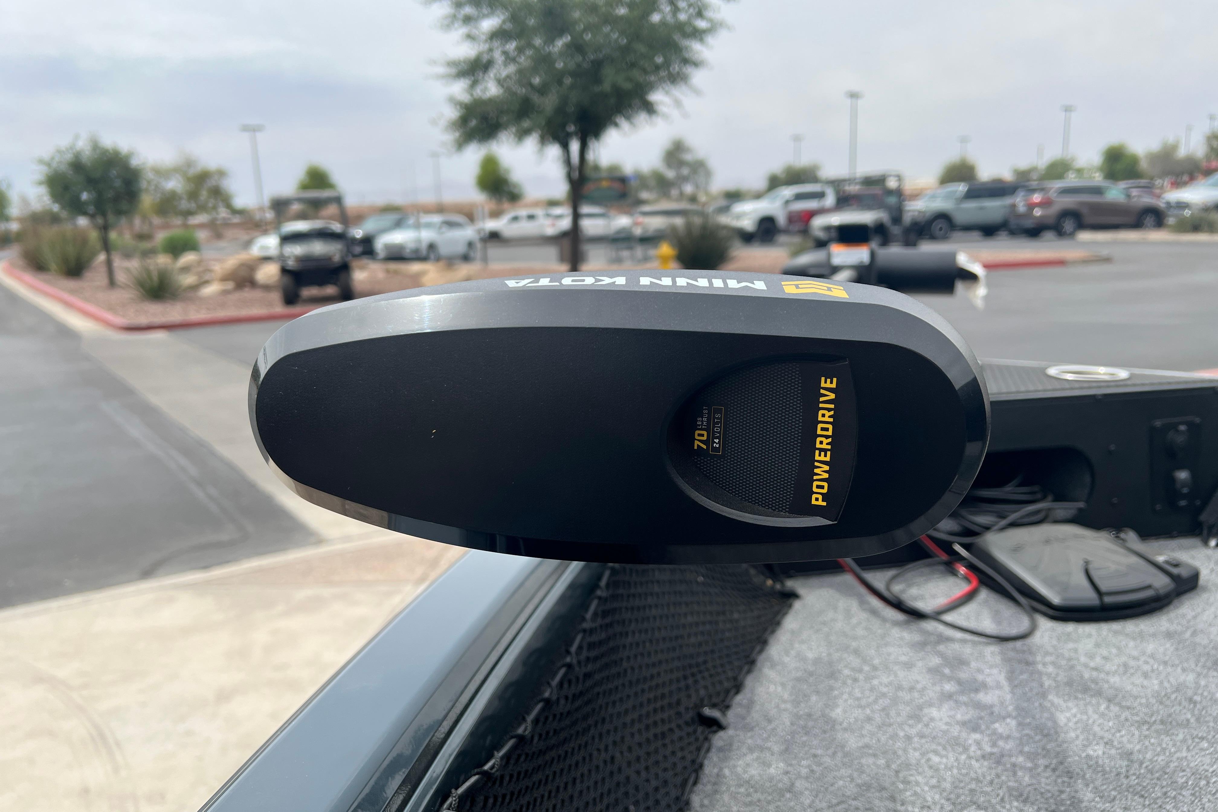 Minn Kota PowerDrive motor on 2026 Ranger VS1682SC Angler boat in parking lot.