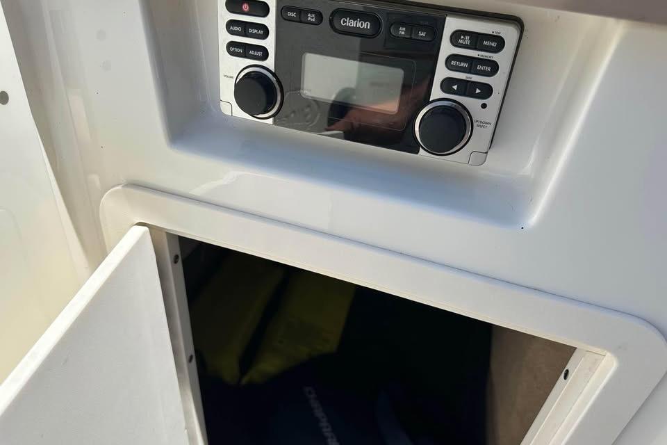 Clarion stereo system in 2012 Chaparral 284 Sunesta boat interior.