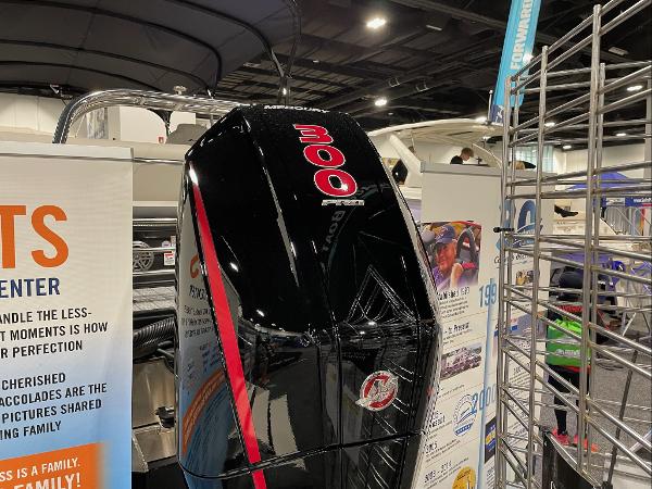 2022 Starcraft SLS-3Q DH boat with a 300 HP Mercury outboard motor at a boat show.