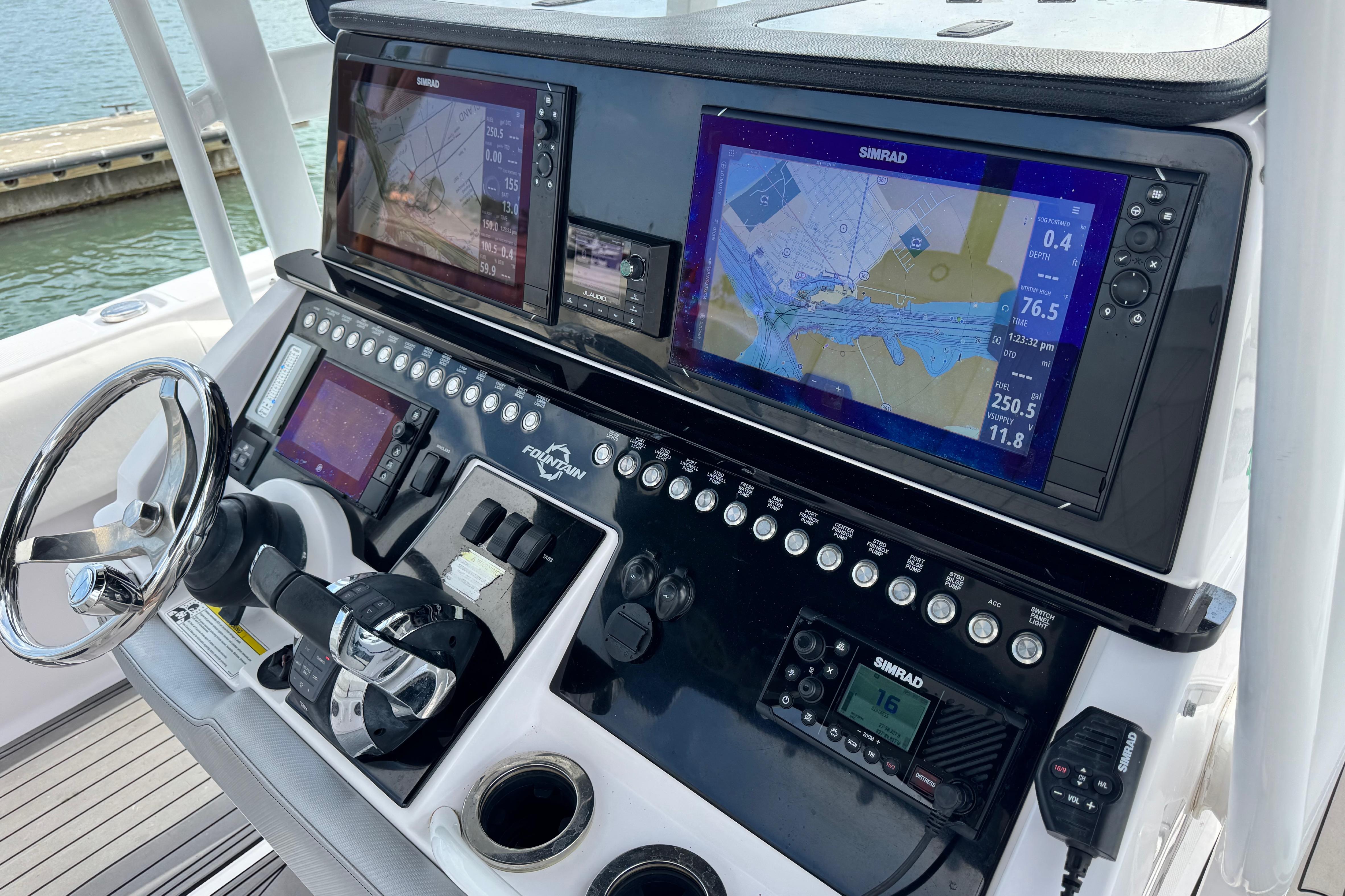 2018 Fountain 34 Center Console boat dashboard with navigation screens and controls.
