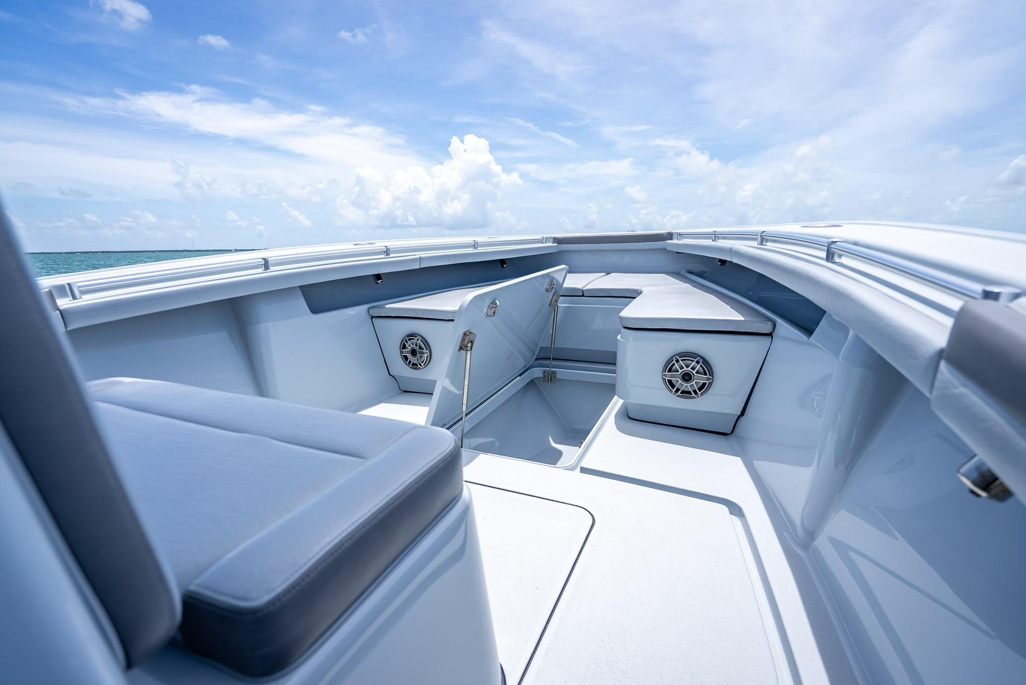 Interior of a 2021 Yellowfin 29 Offshore boat under sunny skies.