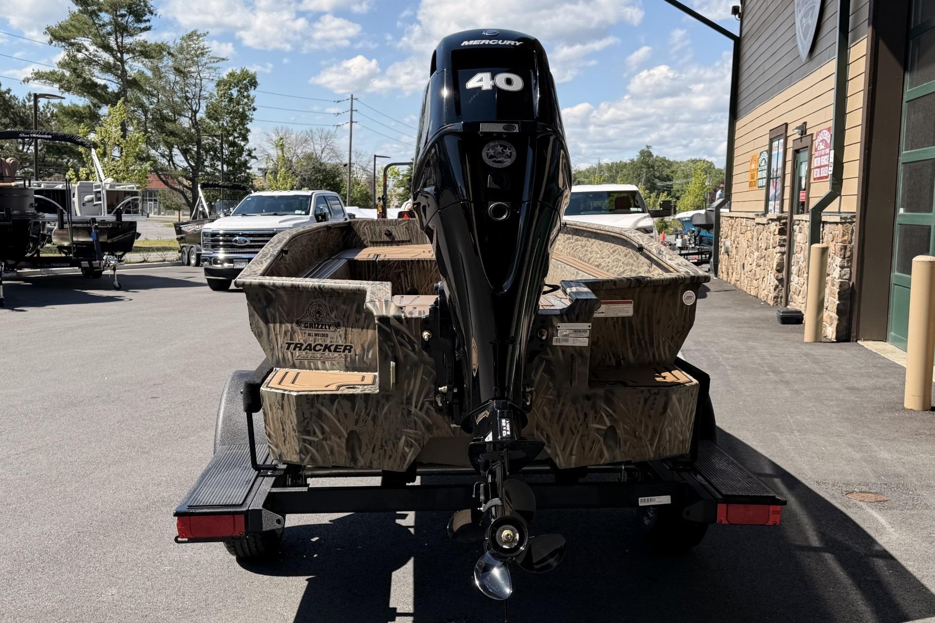 2026 Tracker Grizzly 1650 T Prairie Wings Edition boat with Mercury 40 engine.