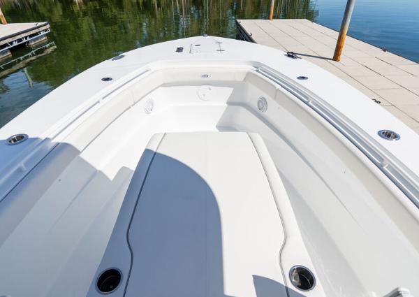 Manufacturer Provided Image: 2026 Sea Hunt Gamefish 28 Coffin Box boat interior, docked on calm water.