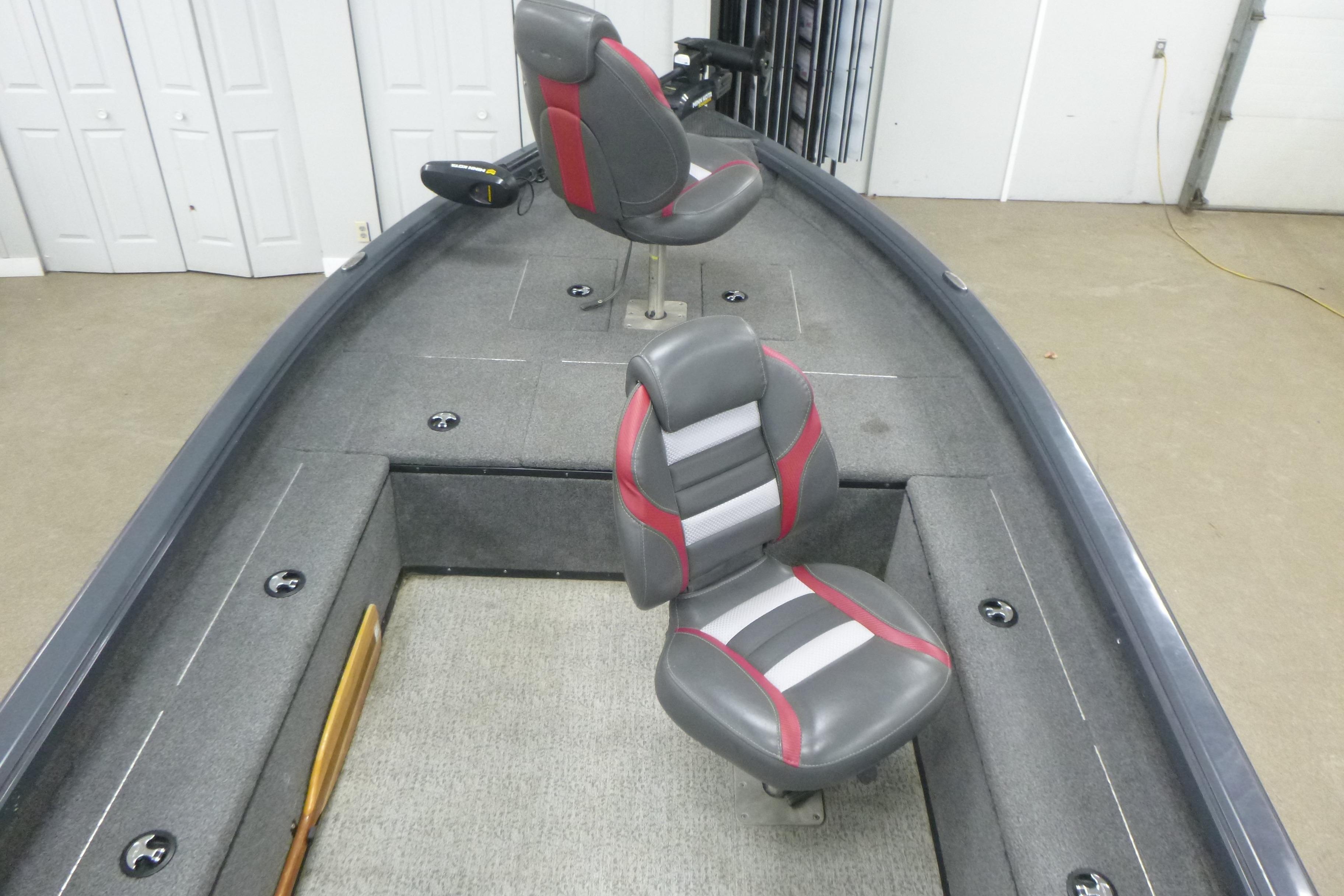 2021 Ranger VS1660 T boat interior with two gray and red seats.