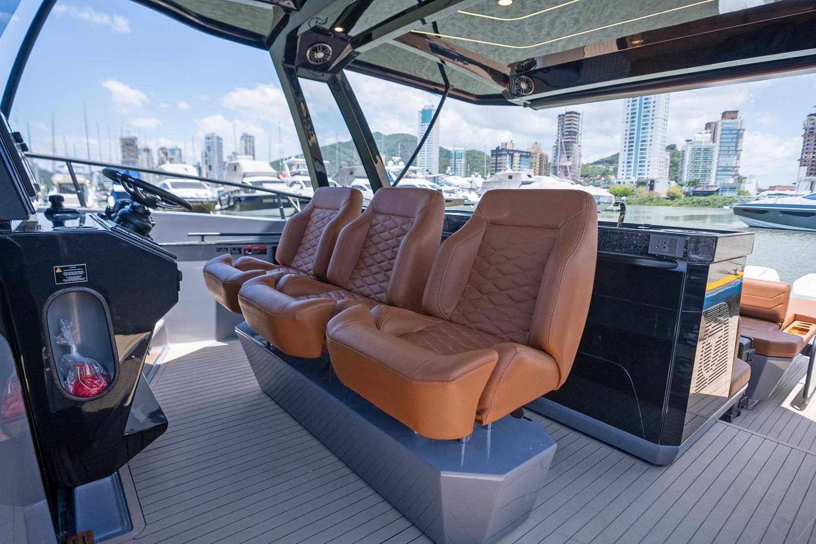 Luxurious interior of 2026 Hanover 447 yacht with leather seats and modern design.