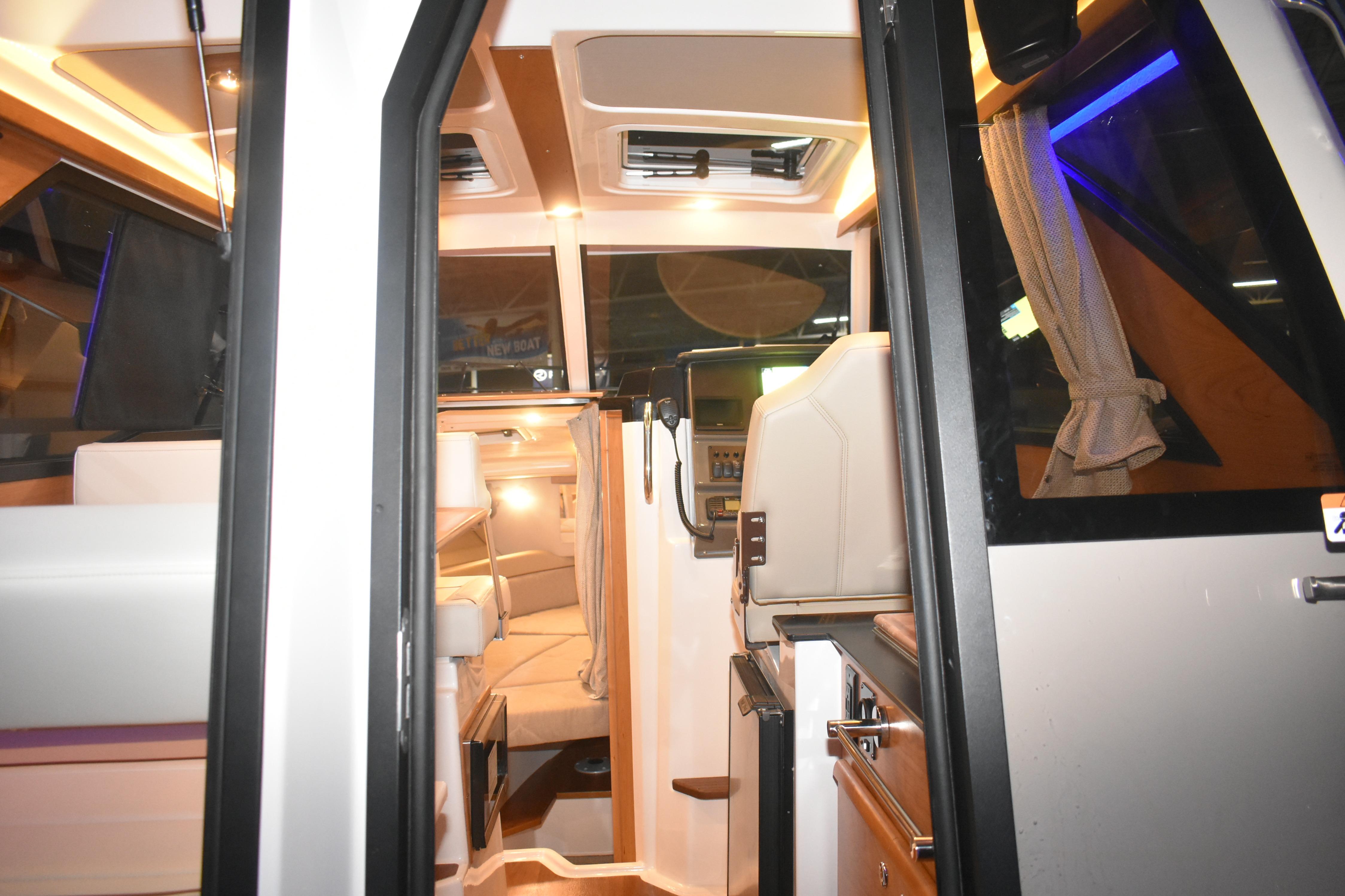 Interior view of 2026 Cutwater C-248 Coupe, showcasing modern design and cozy seating.