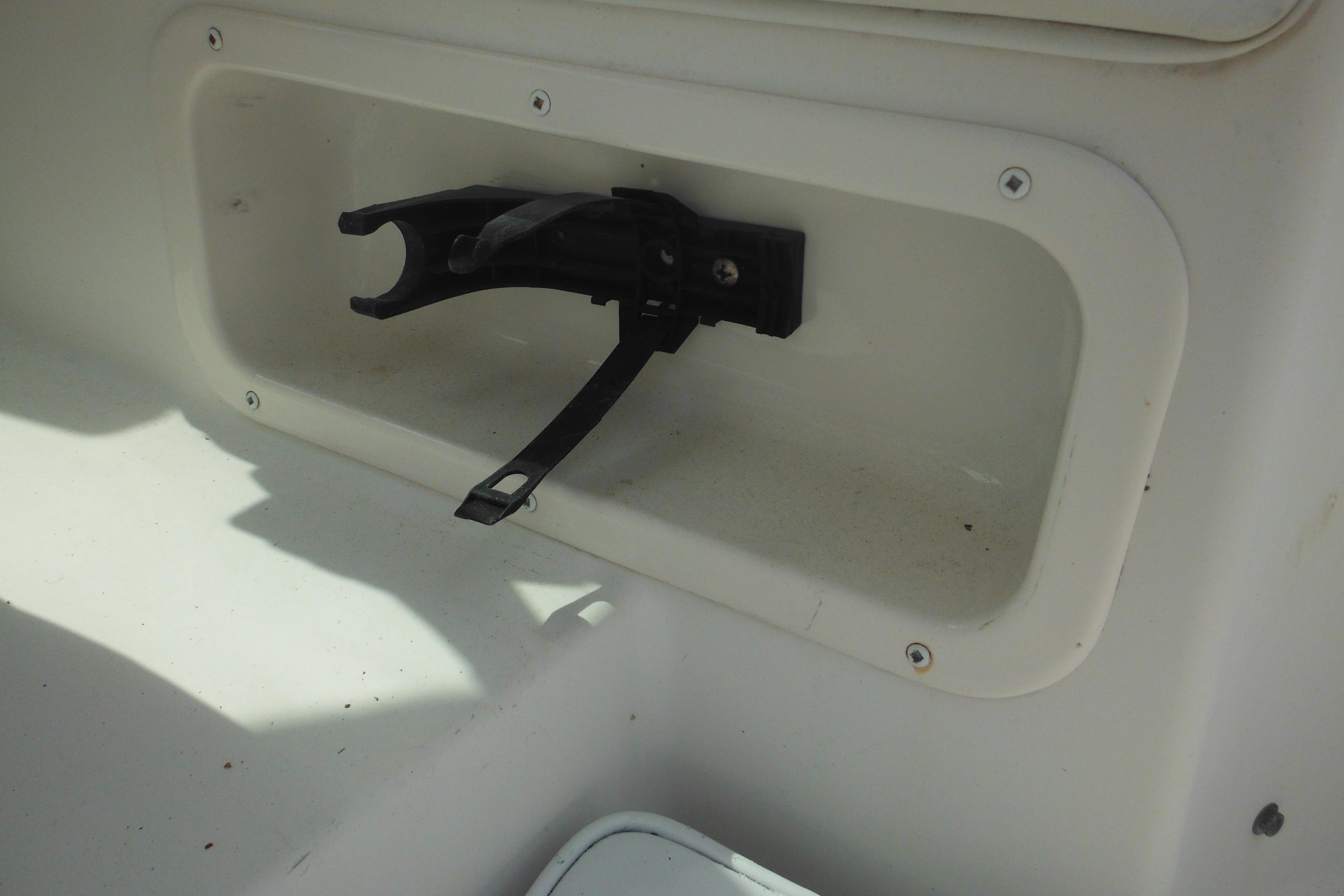 Storage compartment on a 2005 Seaswirl Striper 2101 Walkaround O/B boat.