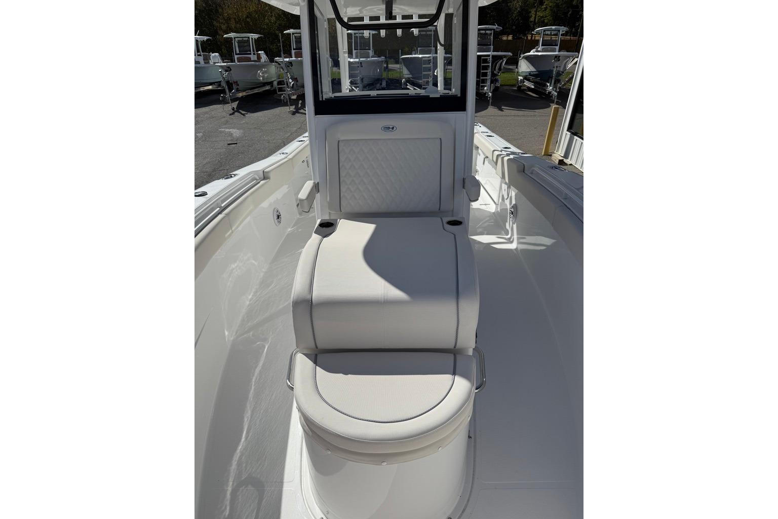2026 Sea Hunt Ultra 285 Coffin Box boat interior with seating and storage.