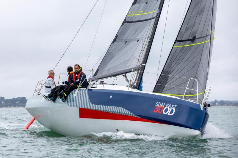2024 Jeanneau Sun Fast 30 One Design sailboat on water, featuring sleek design and modern sails.