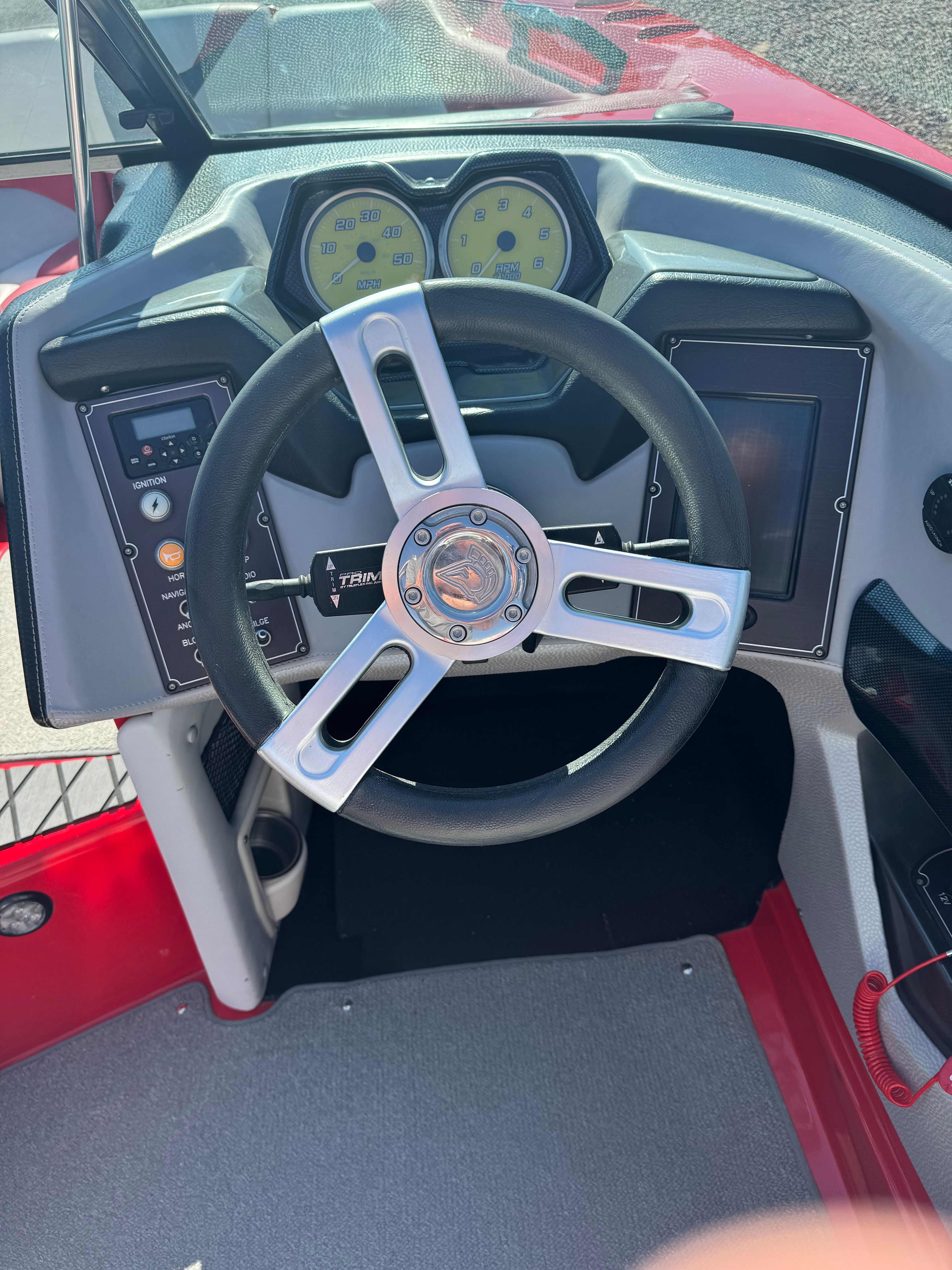Steering wheel of a 2014 Centurion Enzo FX44 boat, close-up.