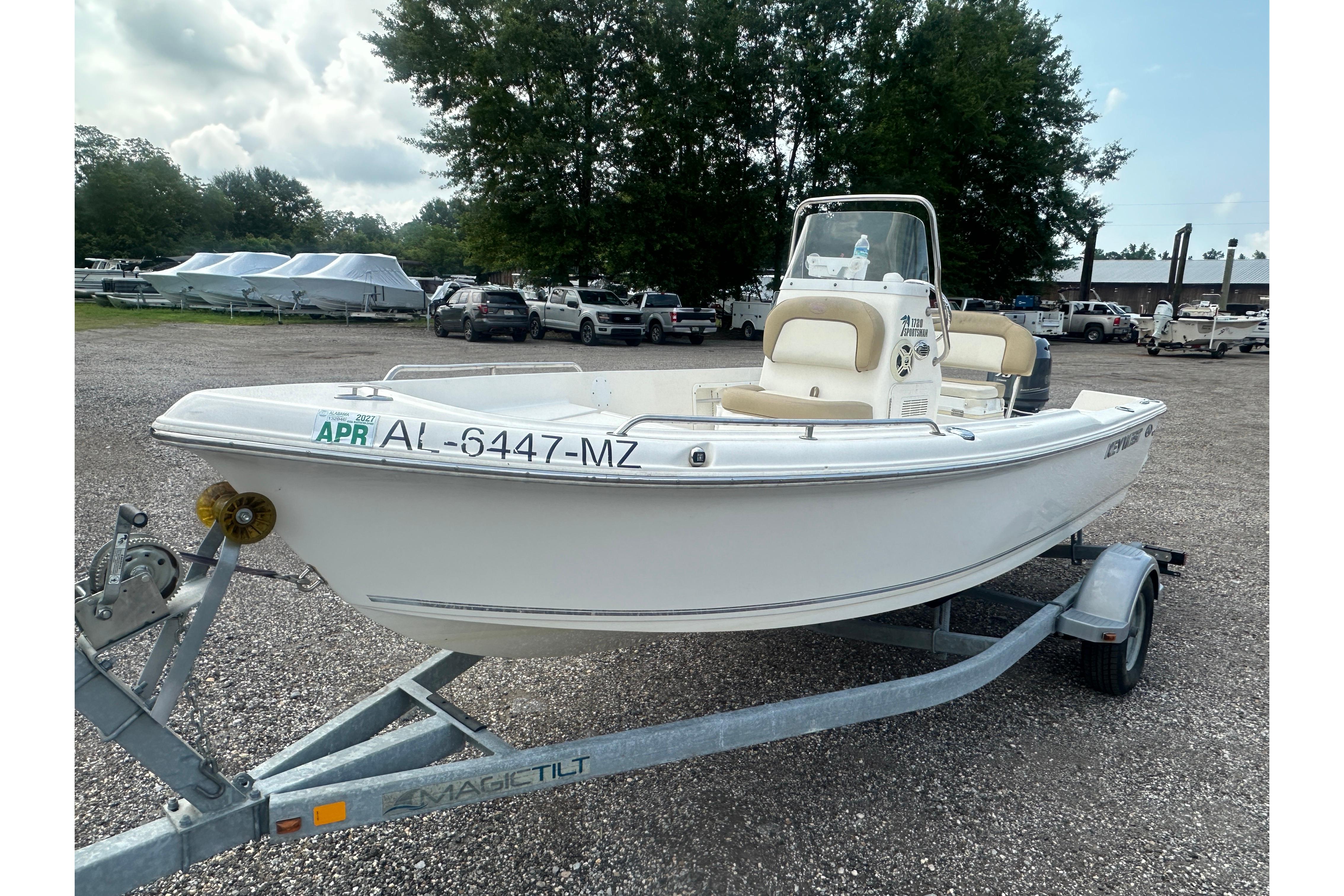 2018 Key West 1720 Center Console boat on trailer in outdoor setting.