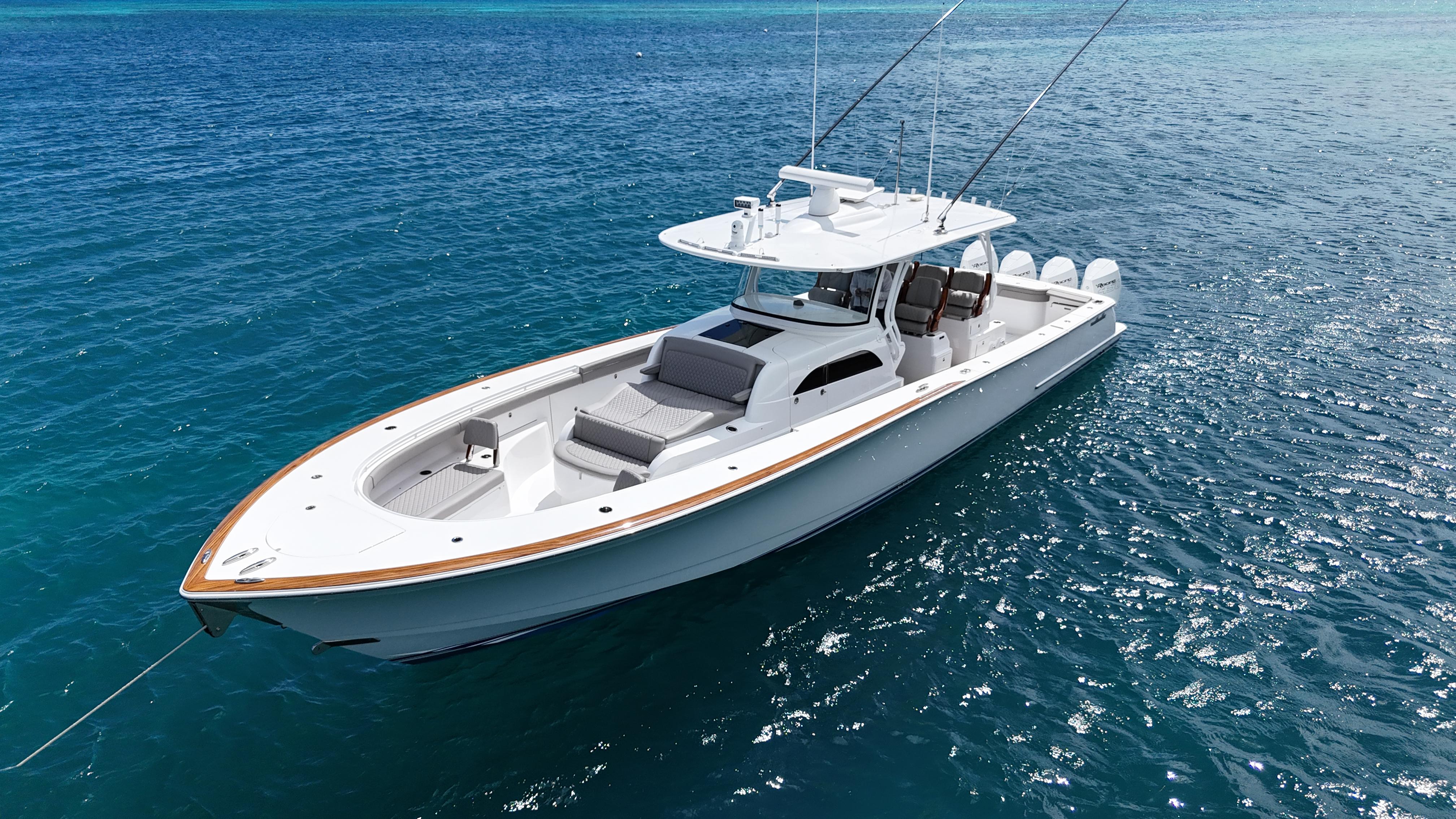 2023 Valhalla Boatworks V-46 cruising on clear blue ocean waters.