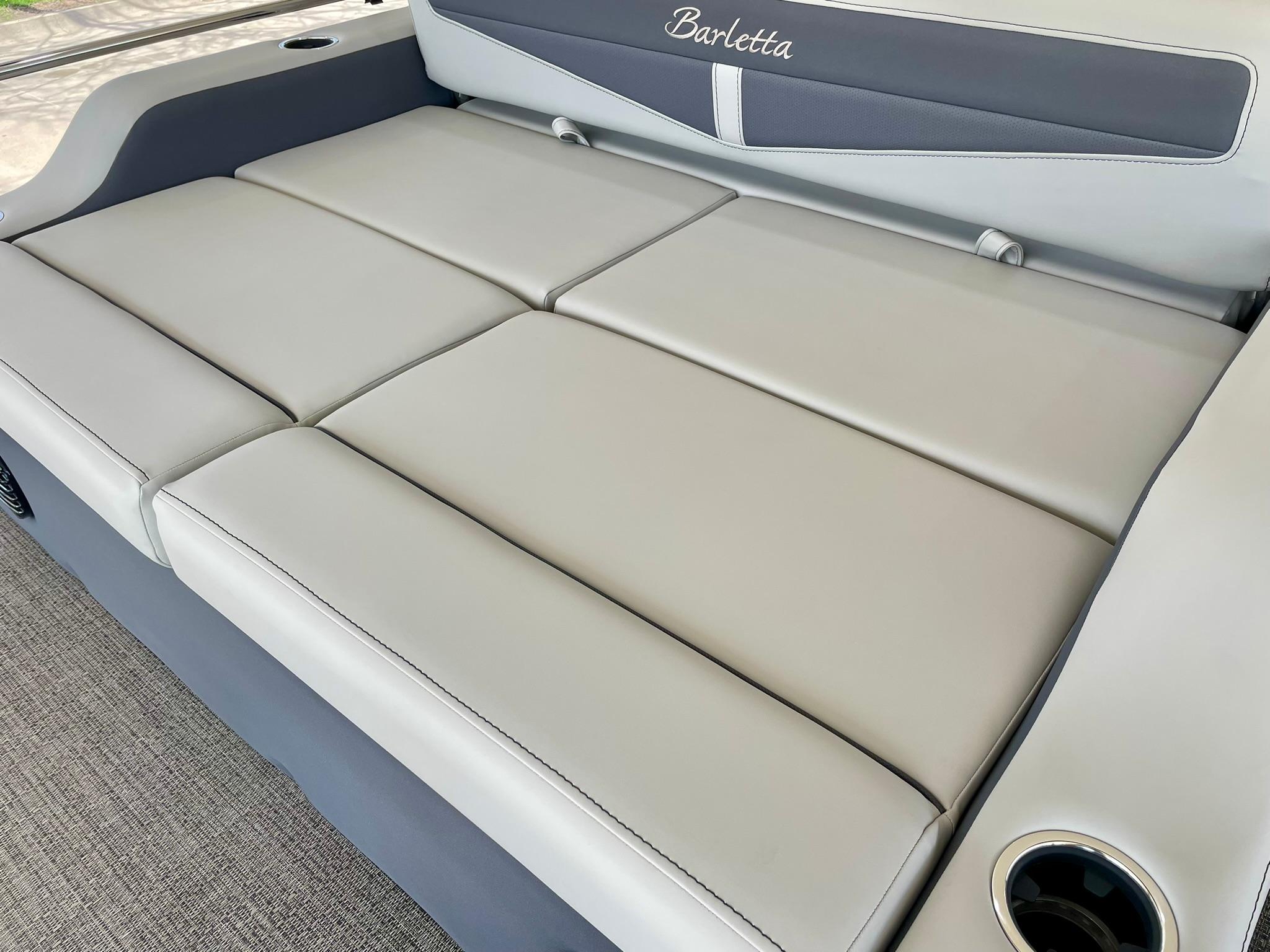 2024 Barletta Cabrio 22UC boat interior seating with gray upholstery.