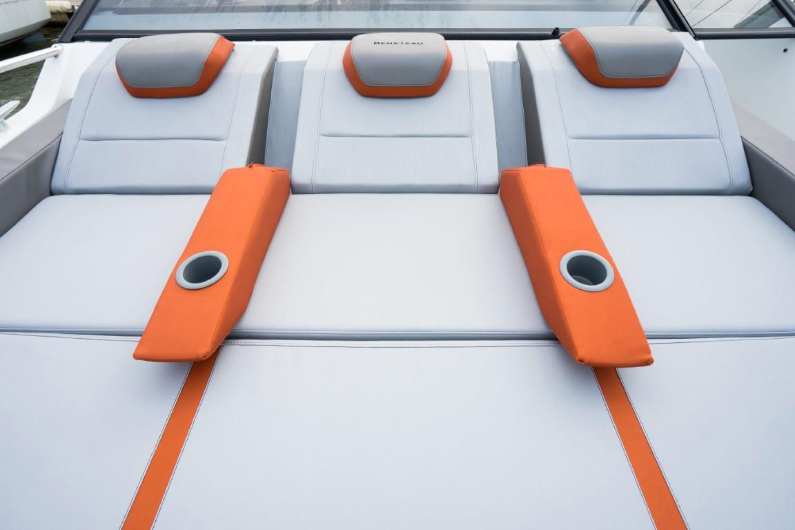 2024 Beneteau Flyer 10 boat with orange and gray cushioned seating.
