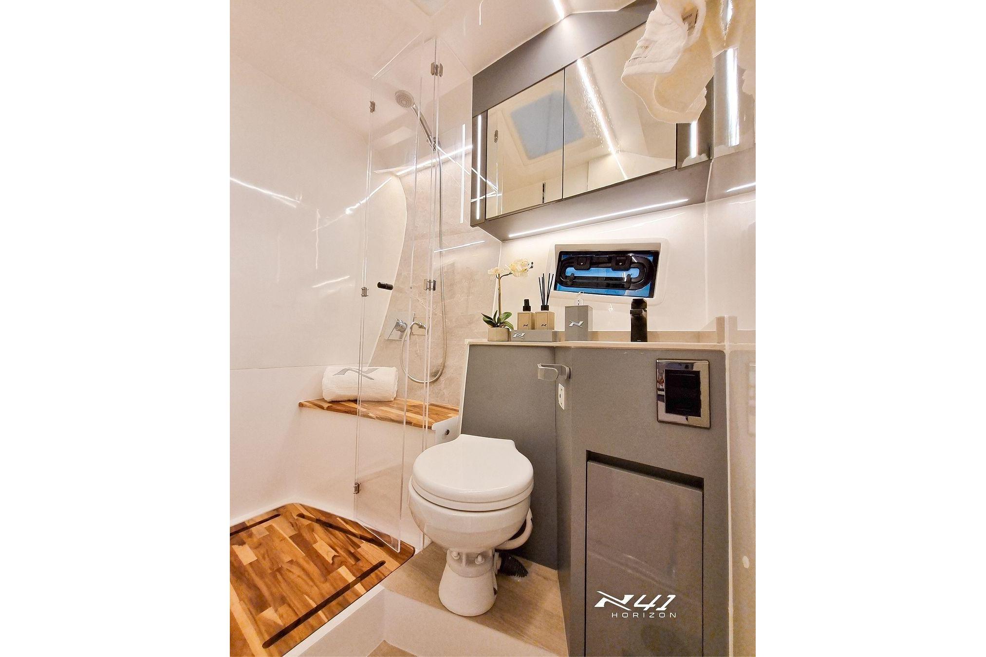 Luxurious bathroom in 2026 NX Boats NX41 HORIZON, featuring modern fixtures and elegant design.