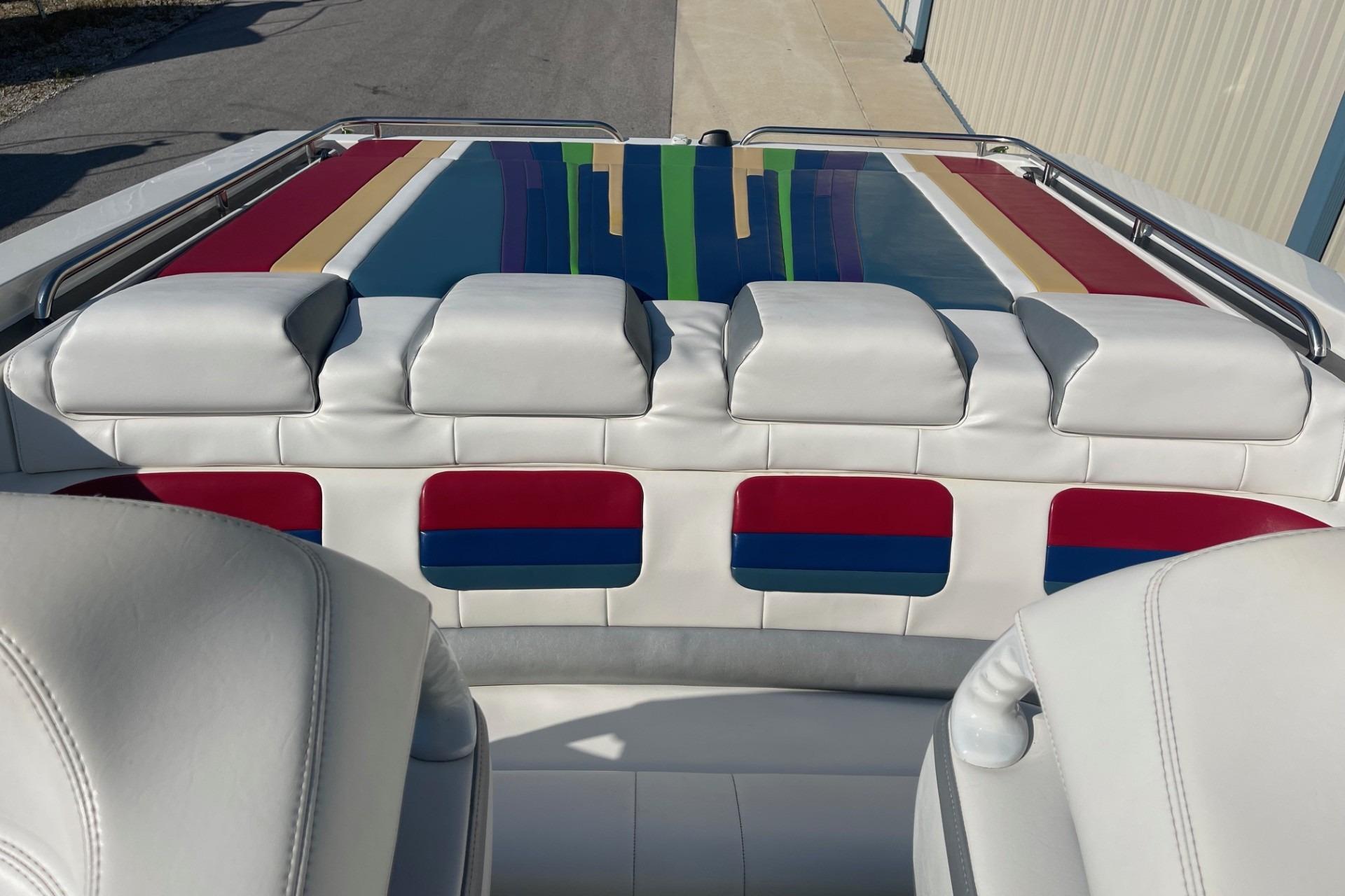 2004 Formula 382 FASTech boat interior with colorful upholstery and sleek design.