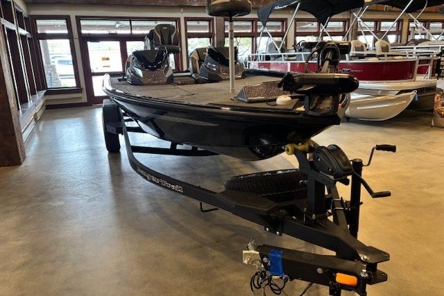2025 Ranger ALPHA 208 boat displayed indoors, showcasing sleek design and modern features.