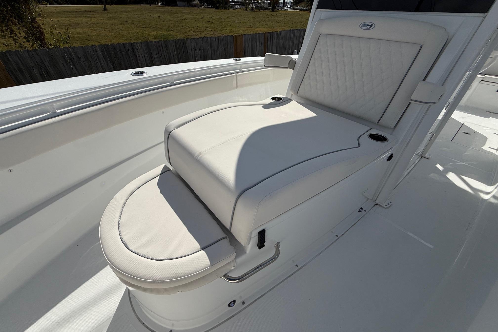 2026 Sea Hunt Ultra 285 Coffin Box boat with cushioned seating.