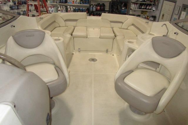 2004 Stingray 240 LR boat interior with beige seating and modern design.
