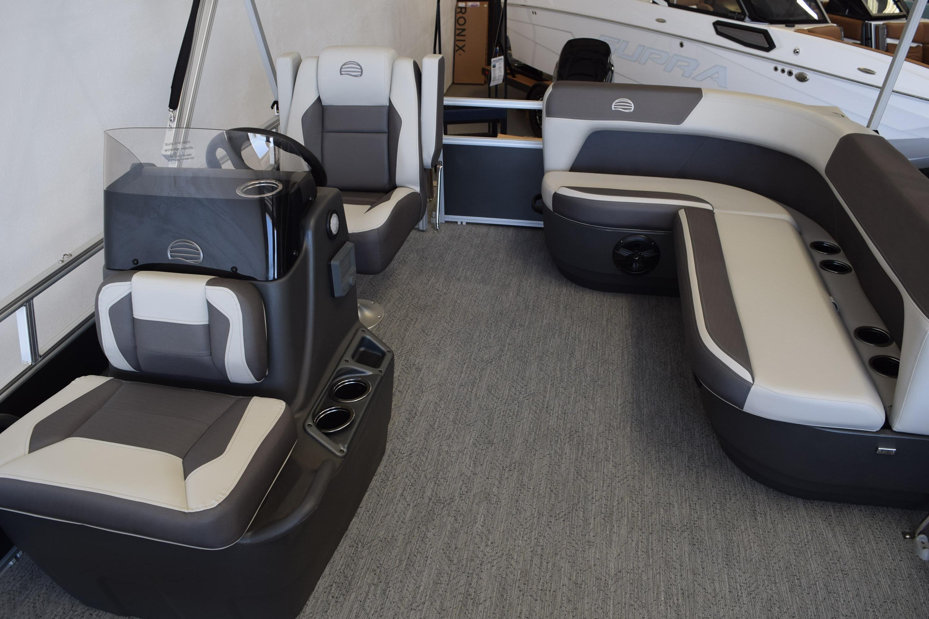 2026 Sun Tracker Bass Buggy 16 XL Select interior with seating and steering console.