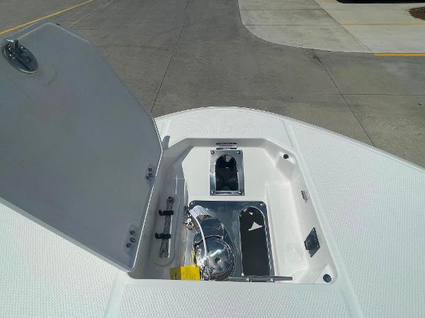 2023 Robalo R270 boat anchor compartment with open hatch.