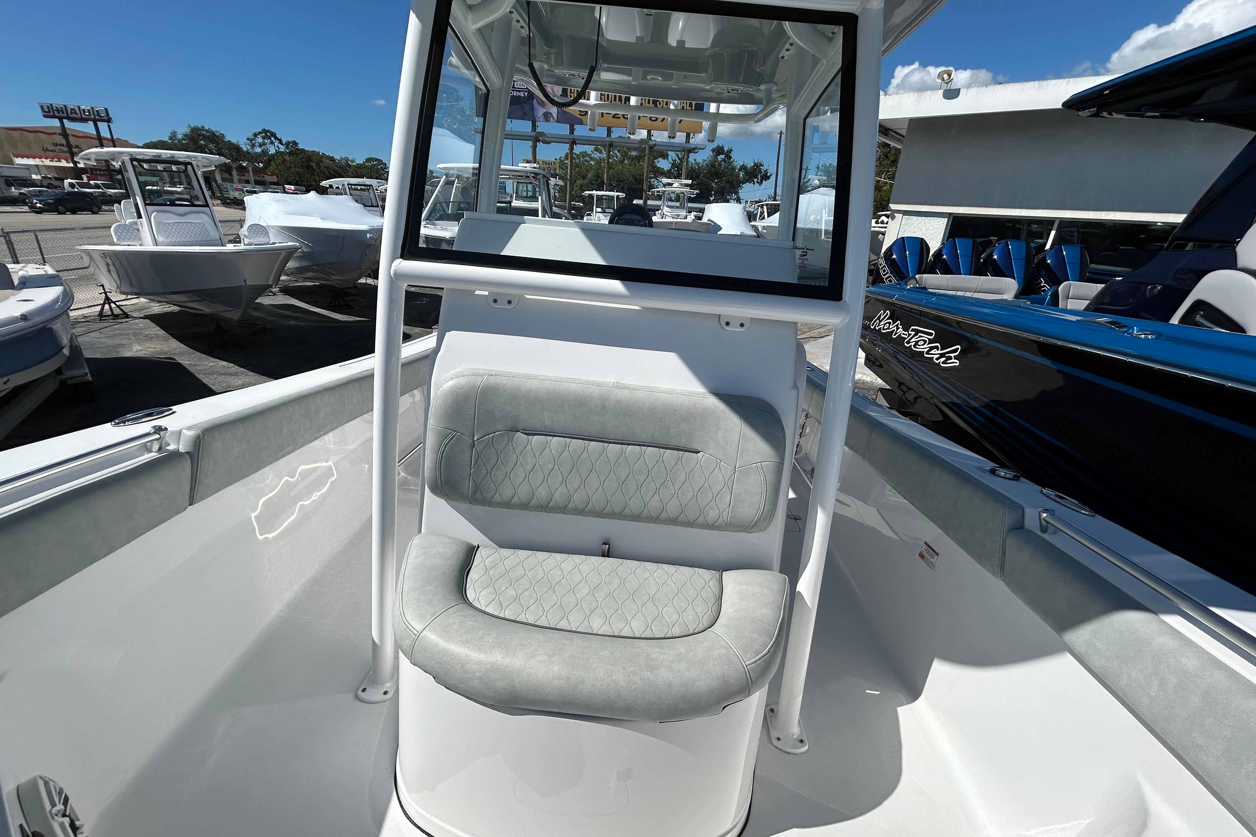 2019 Sportsman Open 282 Center Console boat interior with cushioned seating.