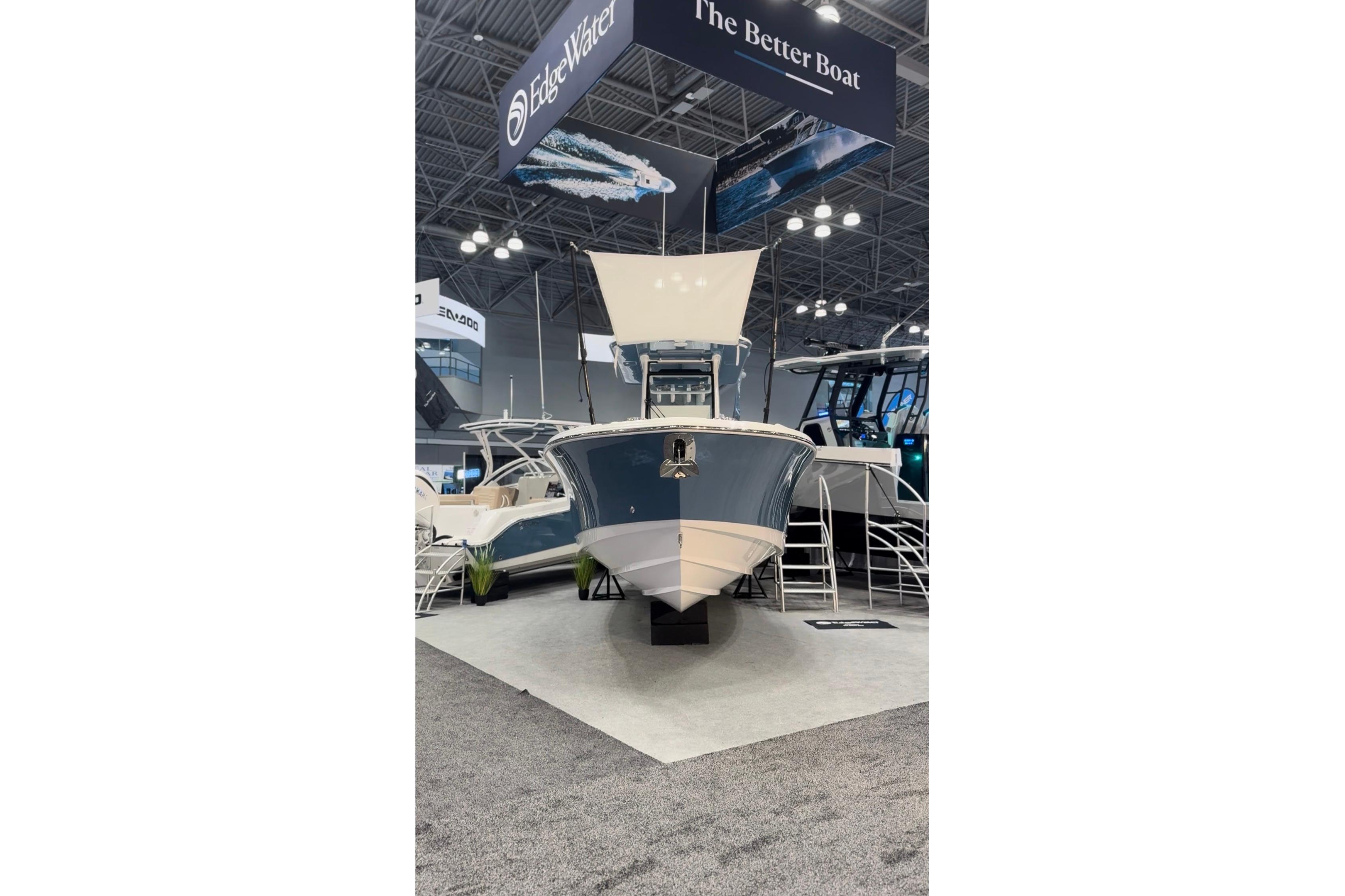 Edgewater 250CC 2026 boat displayed at a trade show.