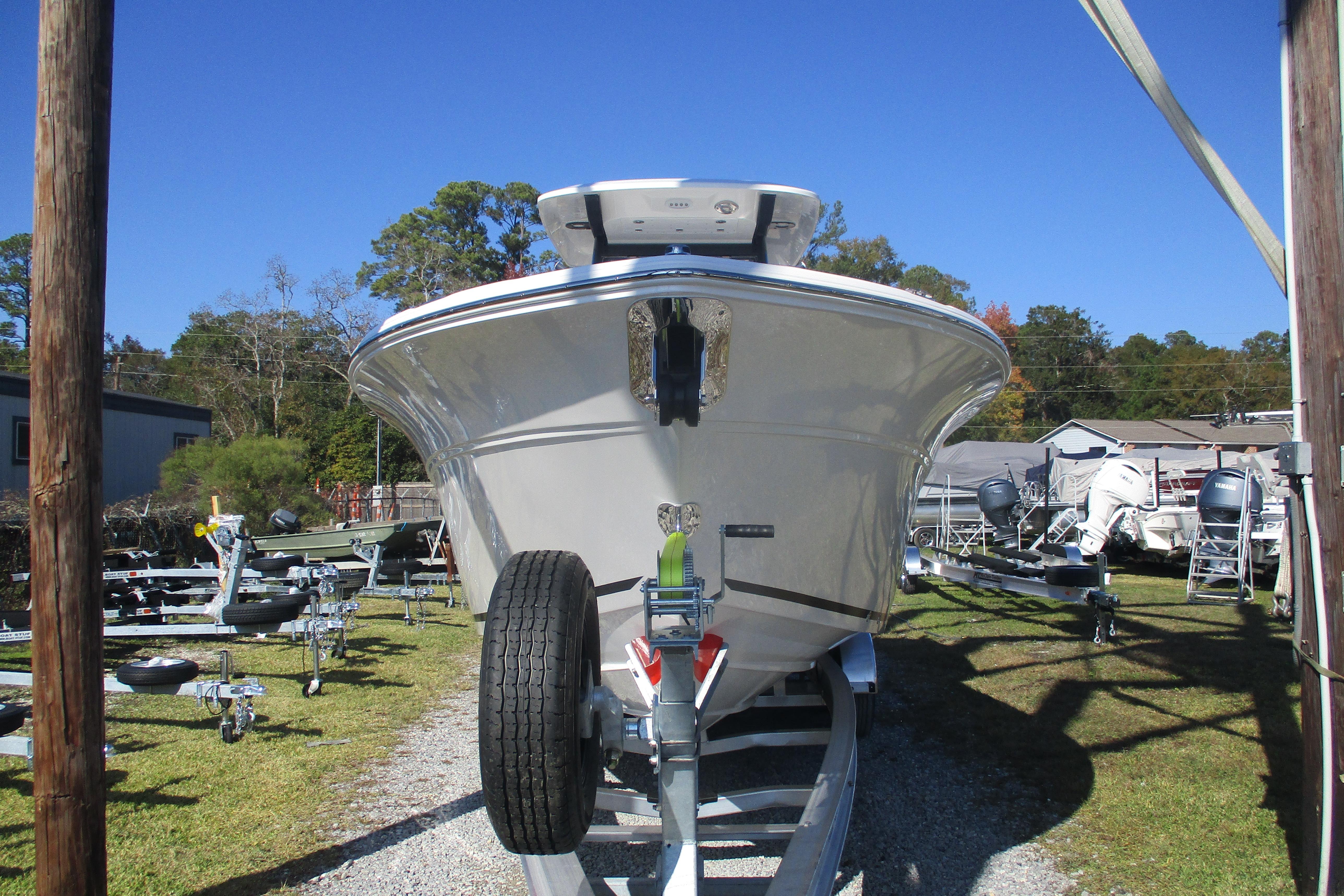 2026 Sea Fox 268 Commander boat on trailer in outdoor storage area.