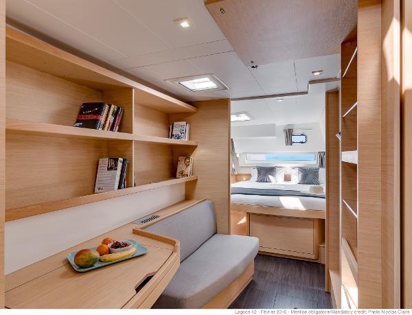 Luxurious interior of 2025 Lagoon 42 Millenium yacht with modern furnishings and natural light.