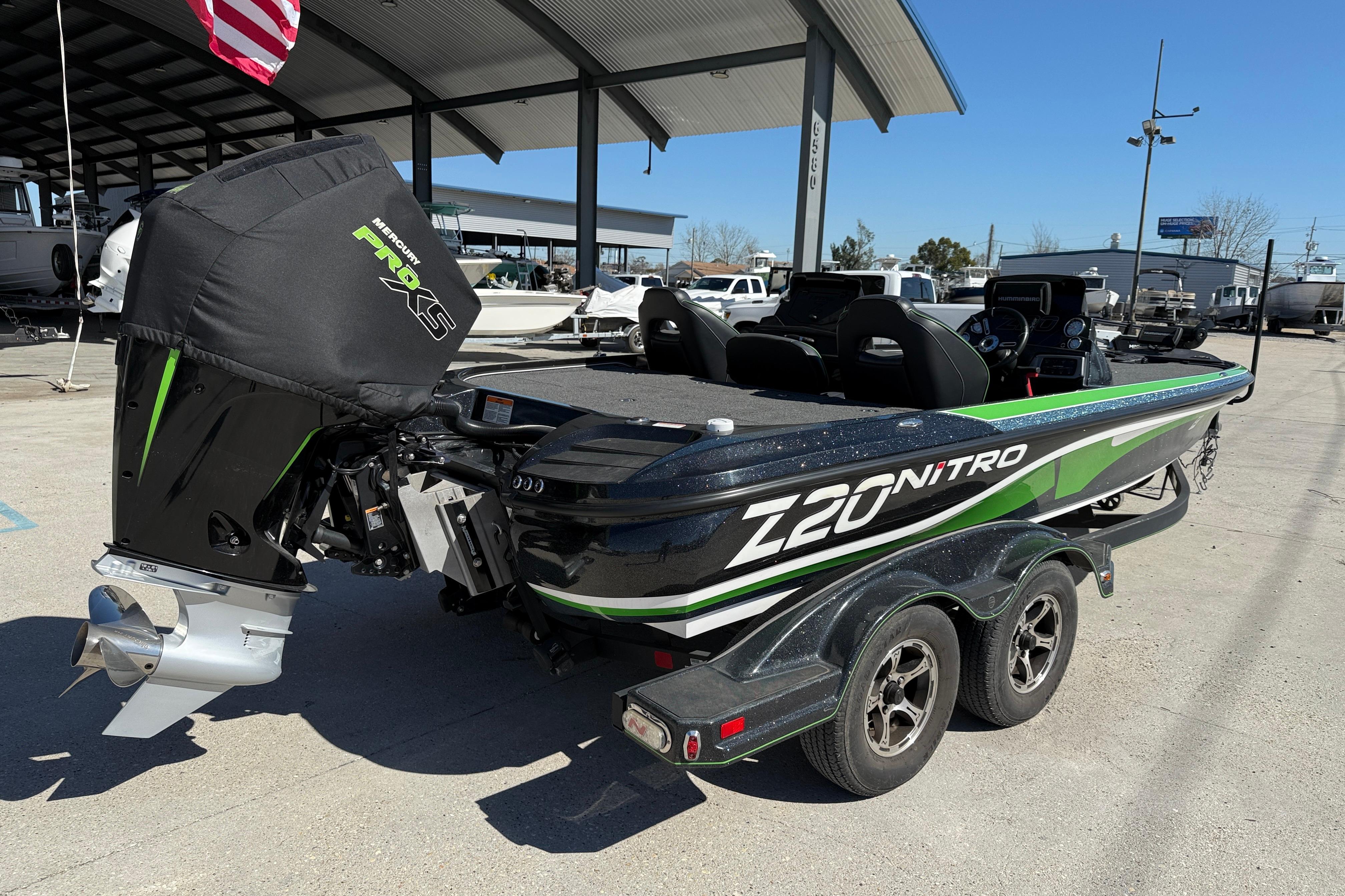 2020 Nitro Z20 boat with Mercury Pro XS engine, parked under a canopy.