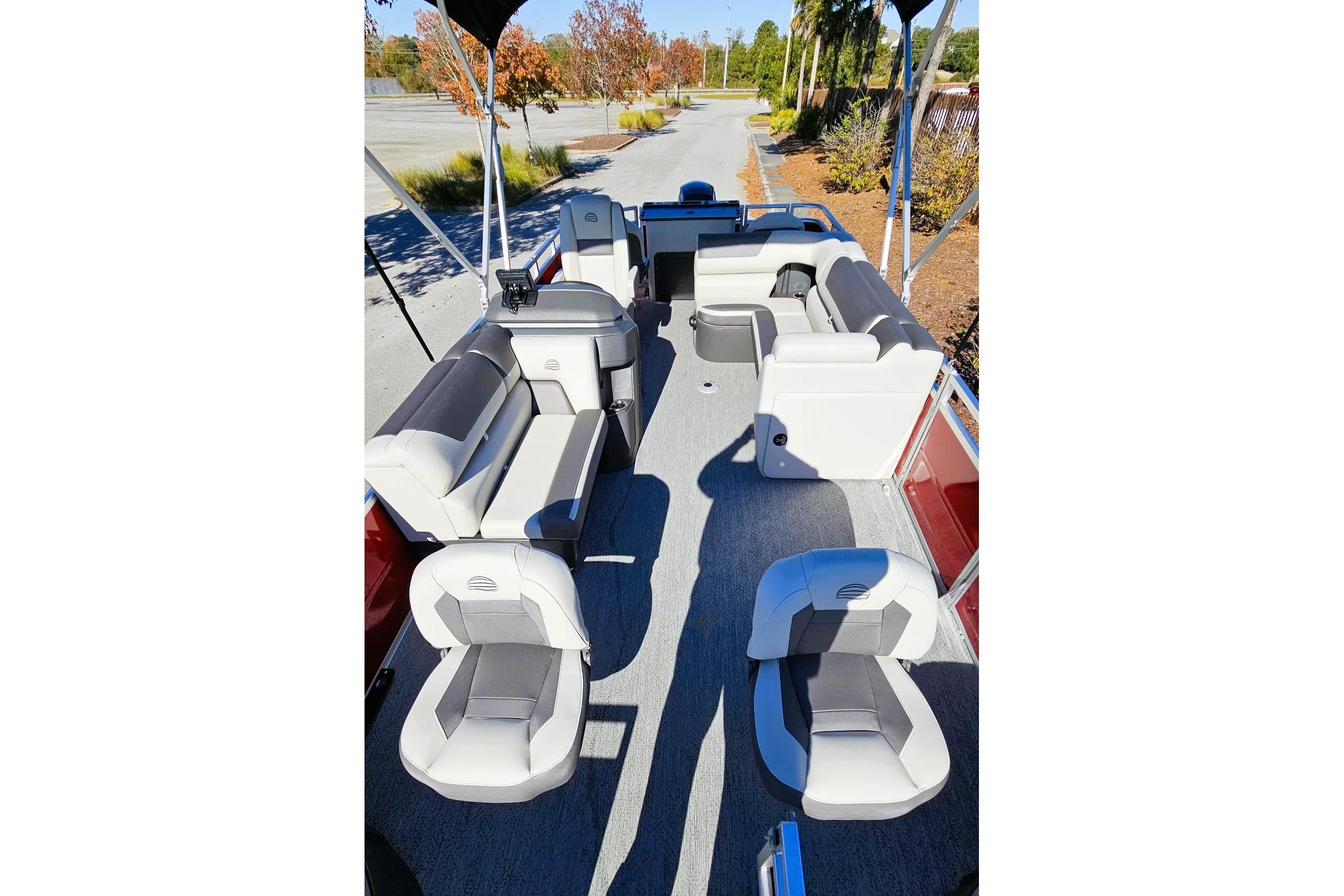 2026 Sun Tracker Fishin' Barge 22 DLX interior with spacious seating and modern design.